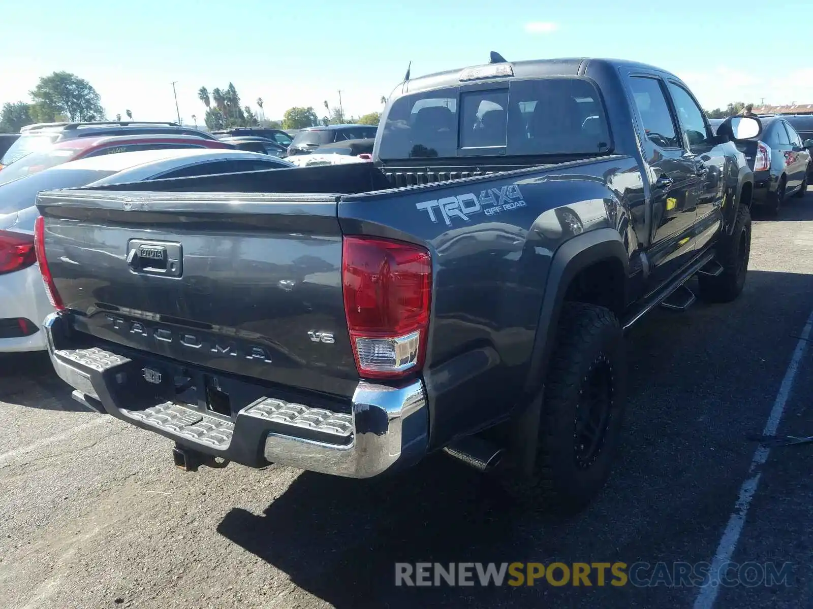 4 Photograph of a damaged car 3TMDZ5BN3KM058195 TOYOTA TACOMA 2019