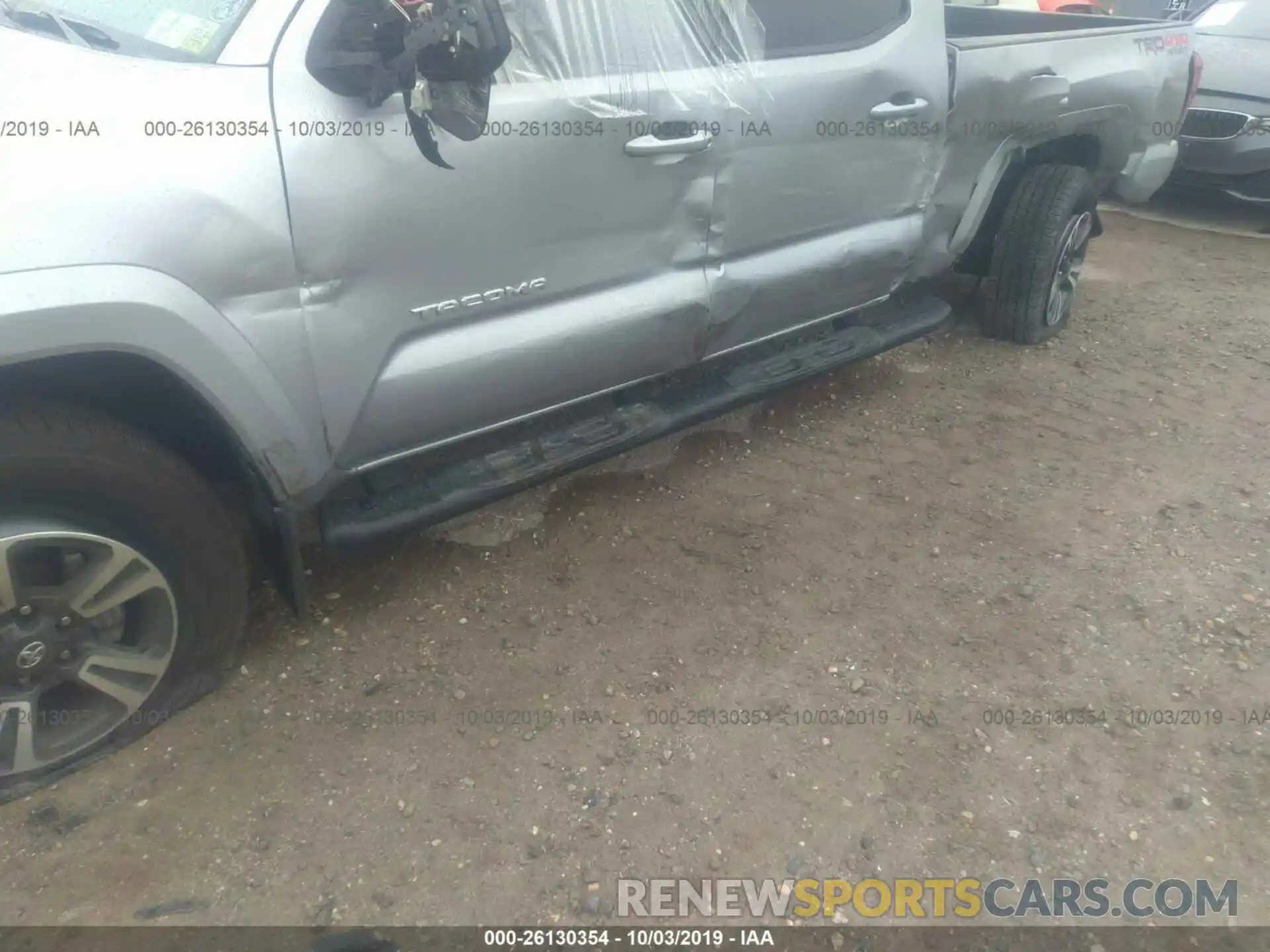 6 Photograph of a damaged car 3TMDZ5BN3KM058987 TOYOTA TACOMA 2019