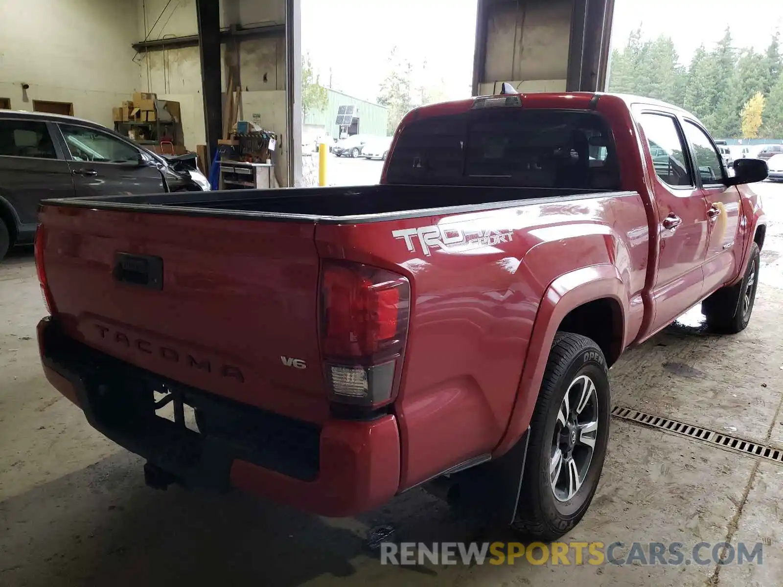 4 Photograph of a damaged car 3TMDZ5BN3KM062540 TOYOTA TACOMA 2019