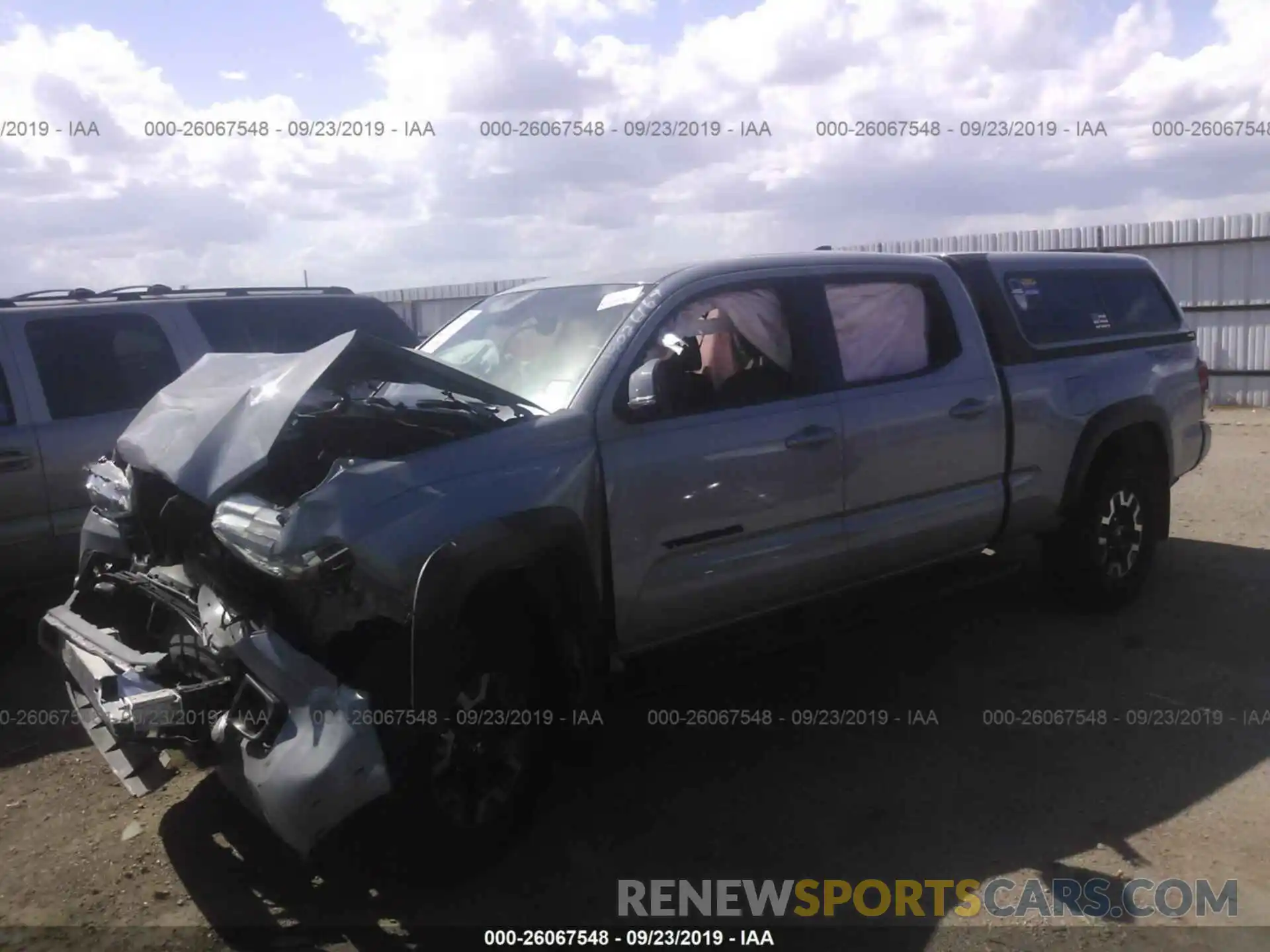 2 Photograph of a damaged car 3TMDZ5BN3KM068435 TOYOTA TACOMA 2019