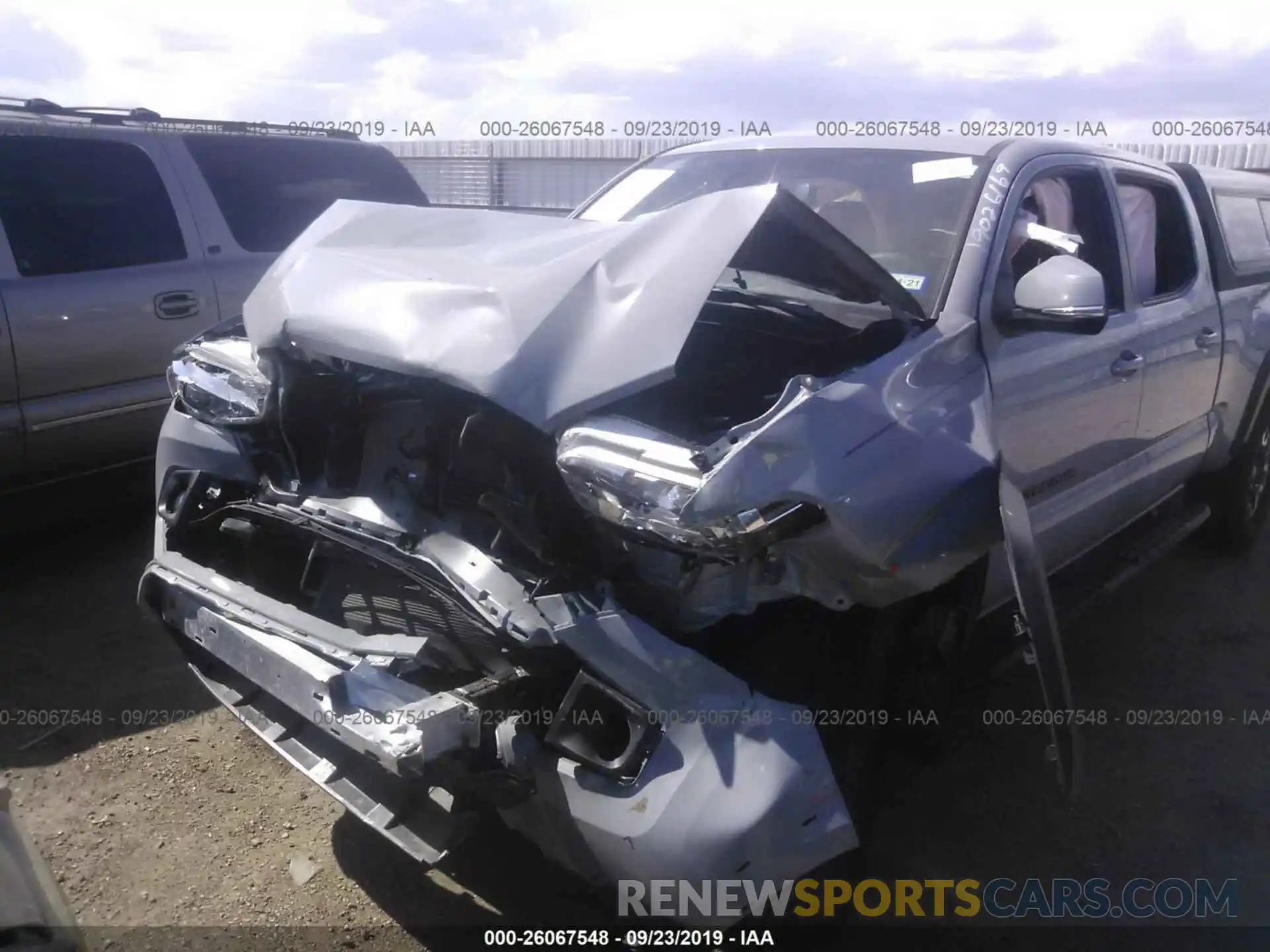 6 Photograph of a damaged car 3TMDZ5BN3KM068435 TOYOTA TACOMA 2019