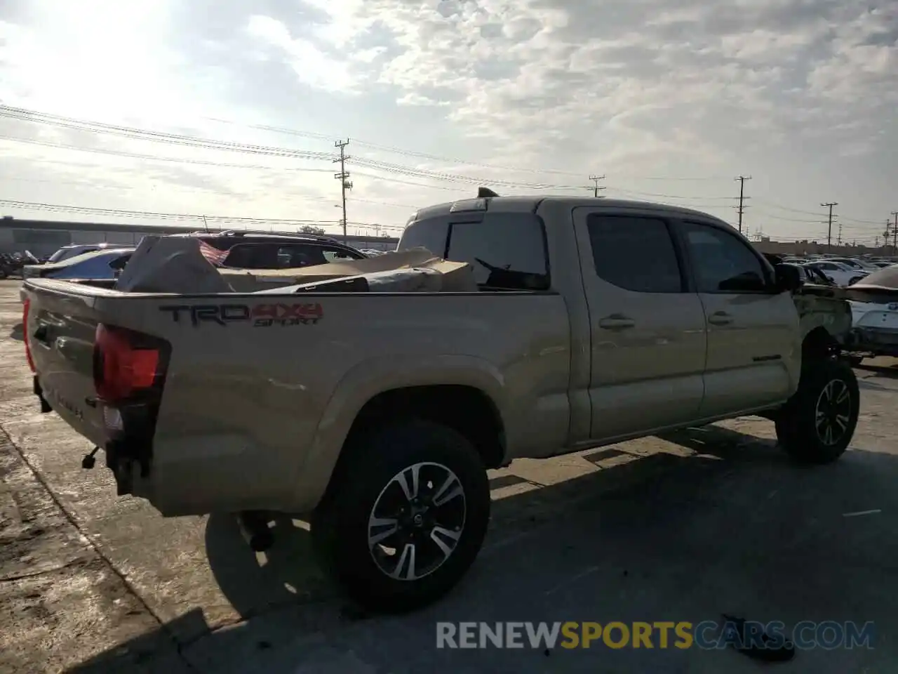 4 Photograph of a damaged car 3TMDZ5BN3KM075823 TOYOTA TACOMA 2019