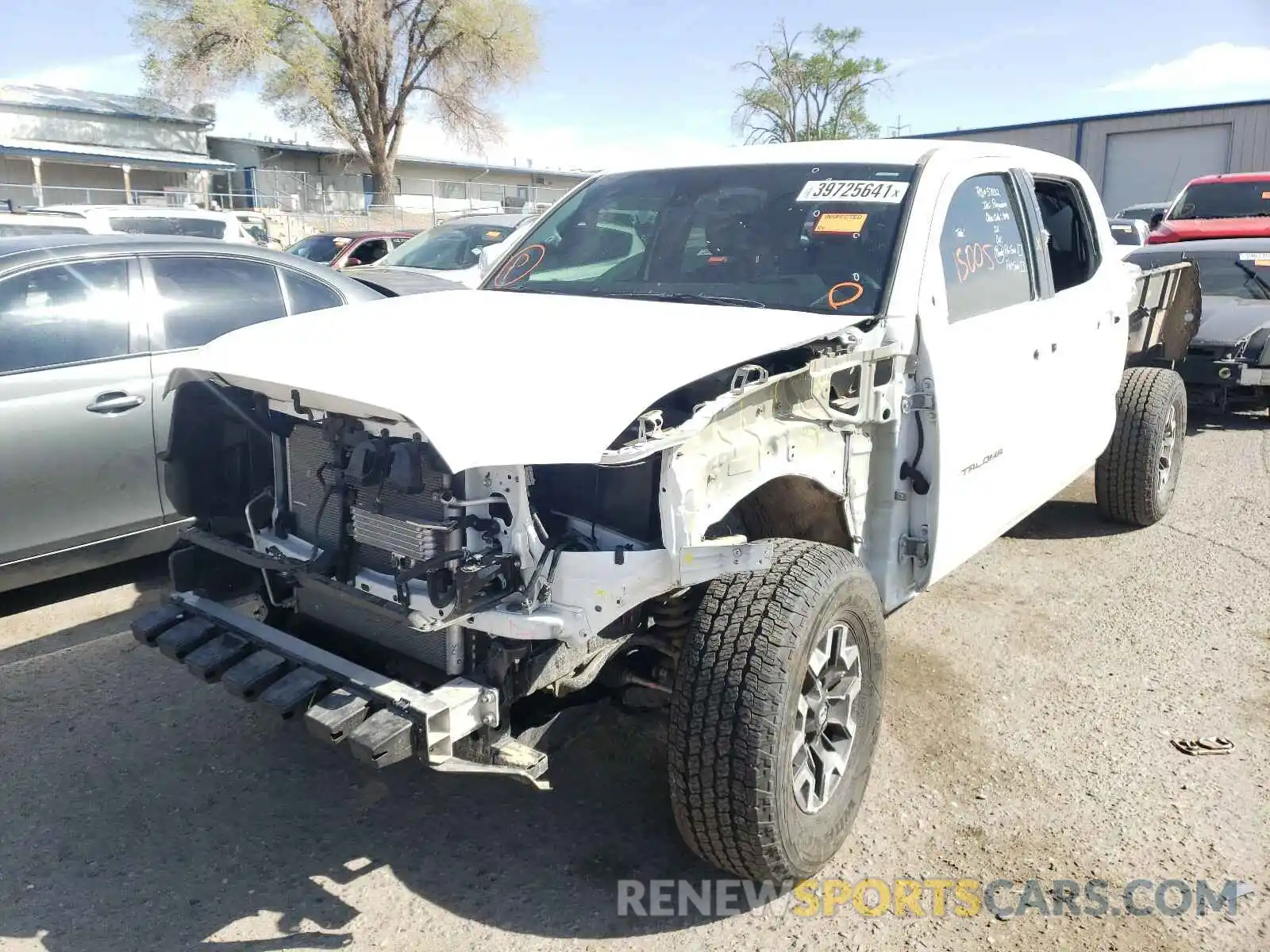 2 Photograph of a damaged car 3TMDZ5BN3KM079659 TOYOTA TACOMA 2019