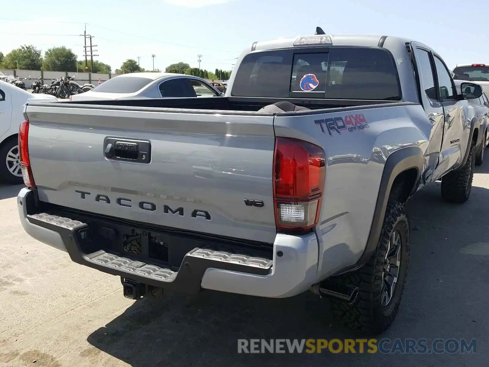 4 Photograph of a damaged car 3TMDZ5BN4KM057413 TOYOTA TACOMA 2019