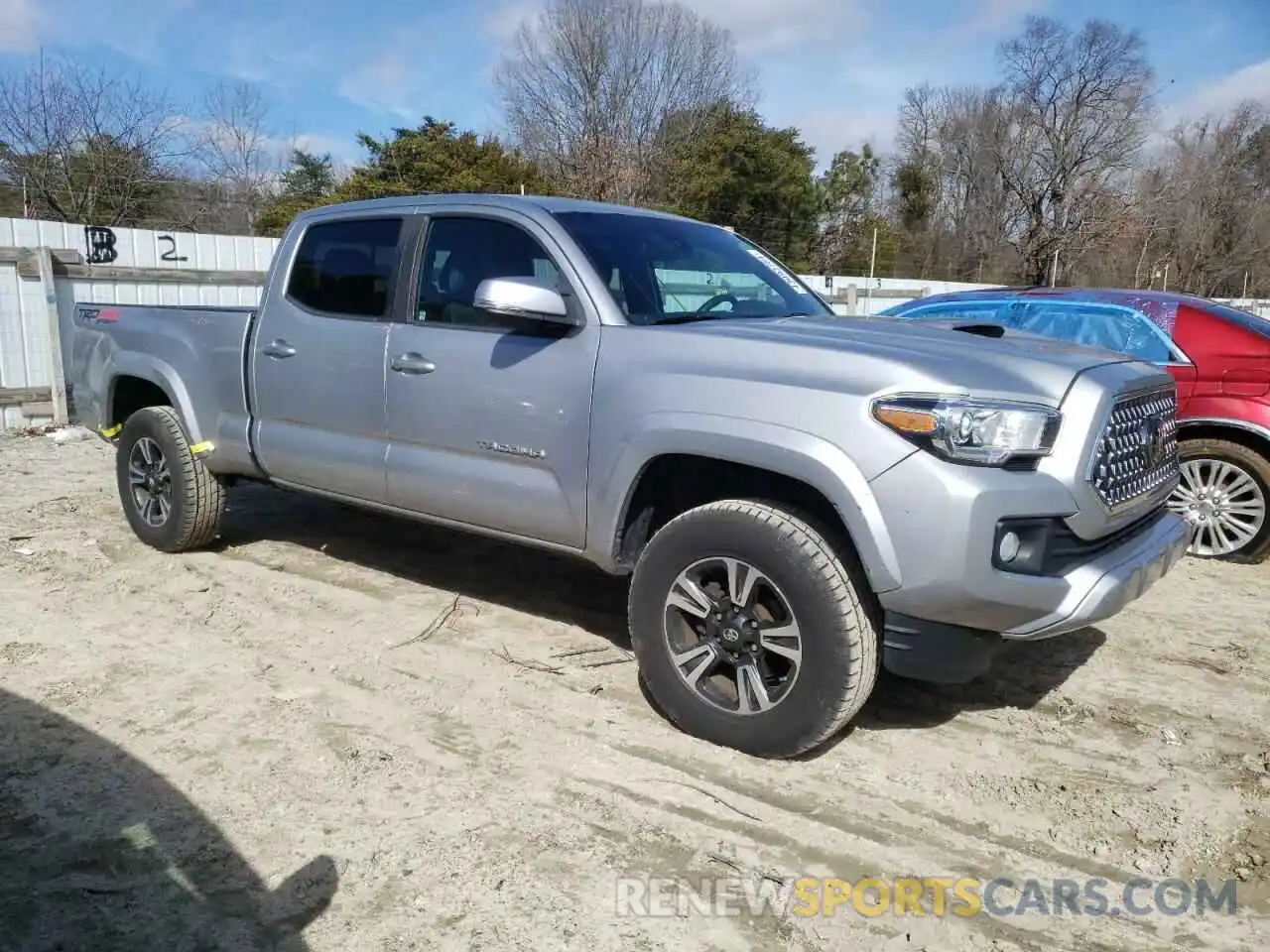 4 Photograph of a damaged car 3TMDZ5BN4KM060862 TOYOTA TACOMA 2019