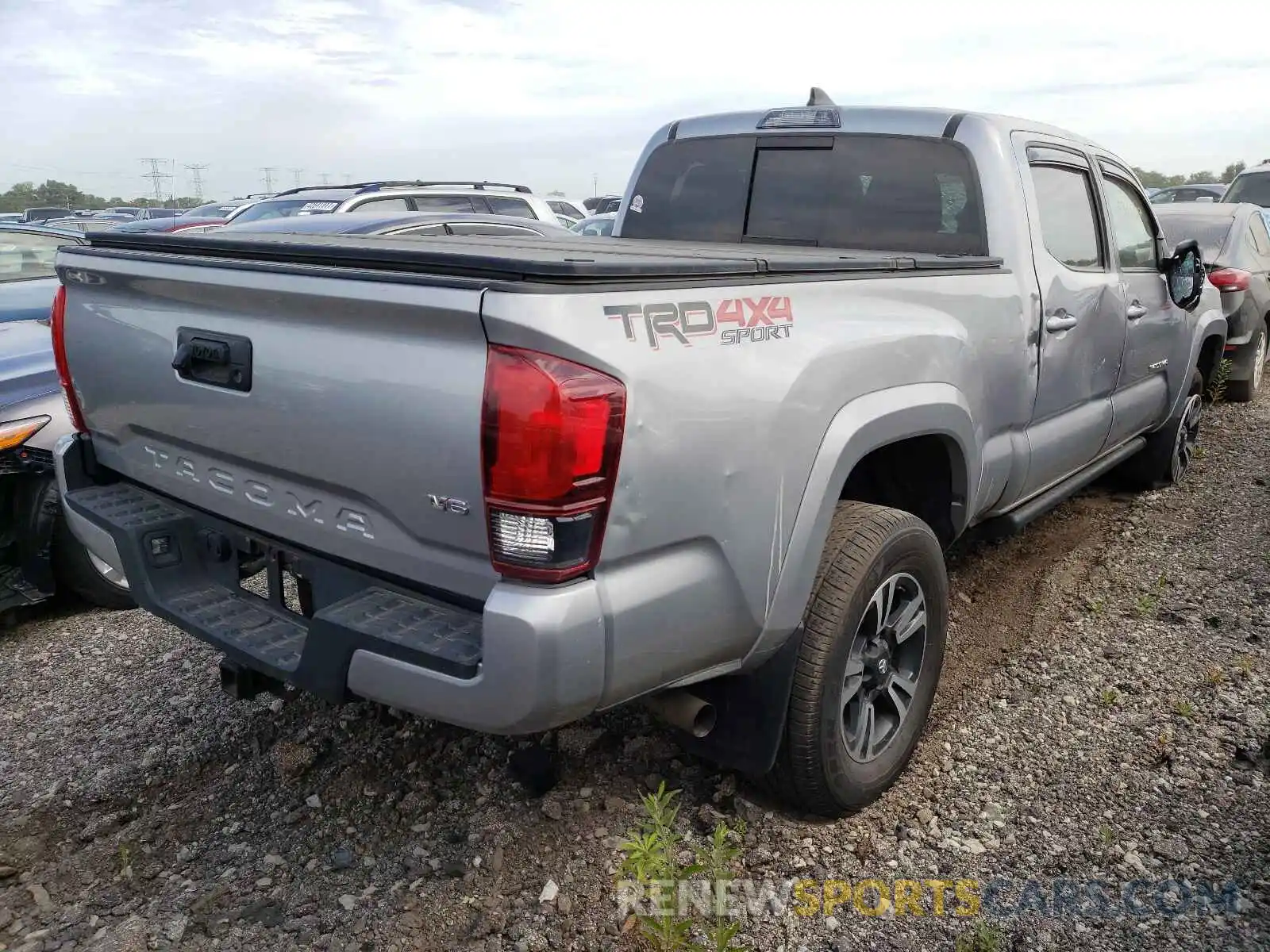 4 Photograph of a damaged car 3TMDZ5BN4KM061770 TOYOTA TACOMA 2019