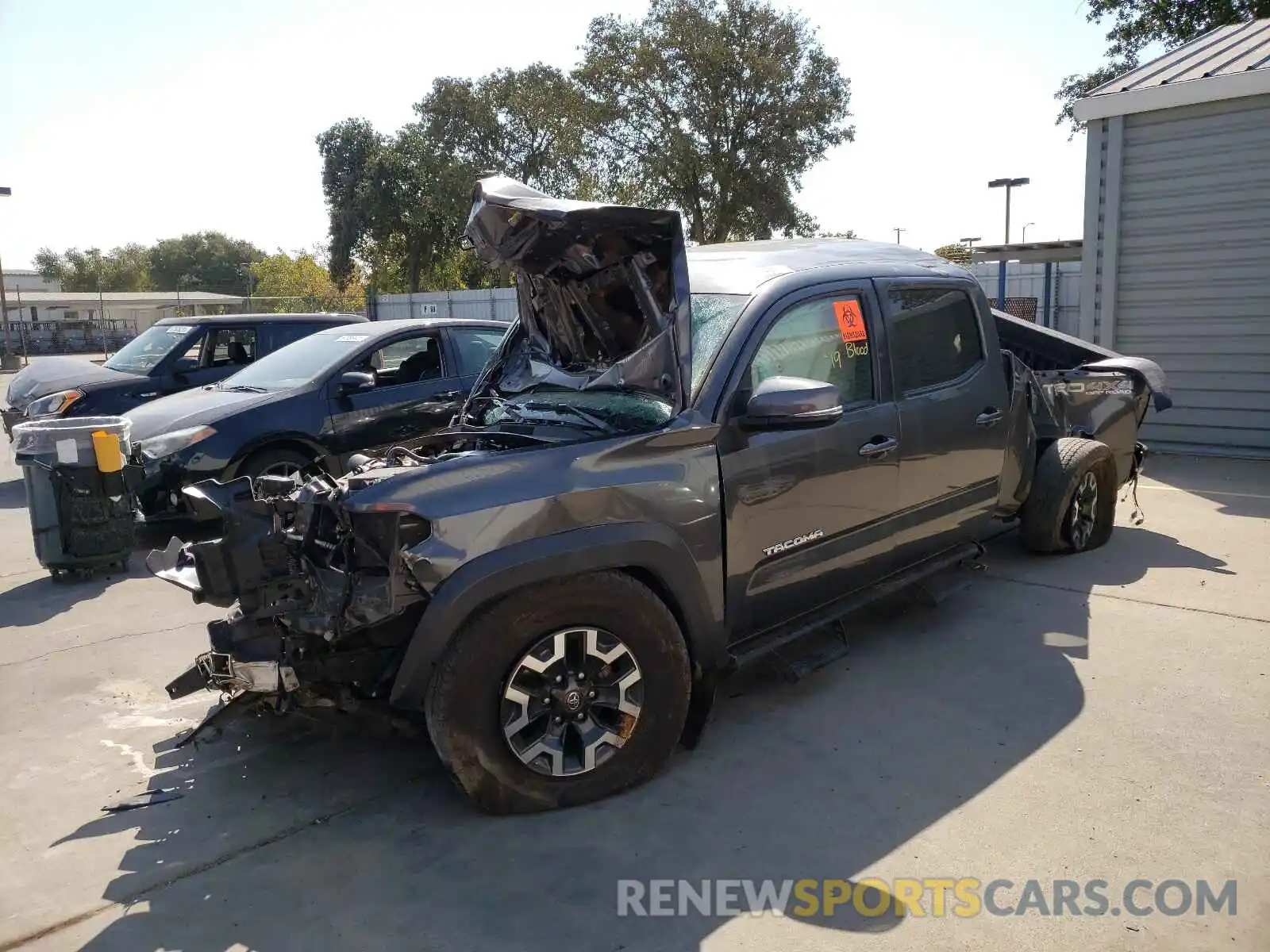 2 Photograph of a damaged car 3TMDZ5BN4KM061879 TOYOTA TACOMA 2019