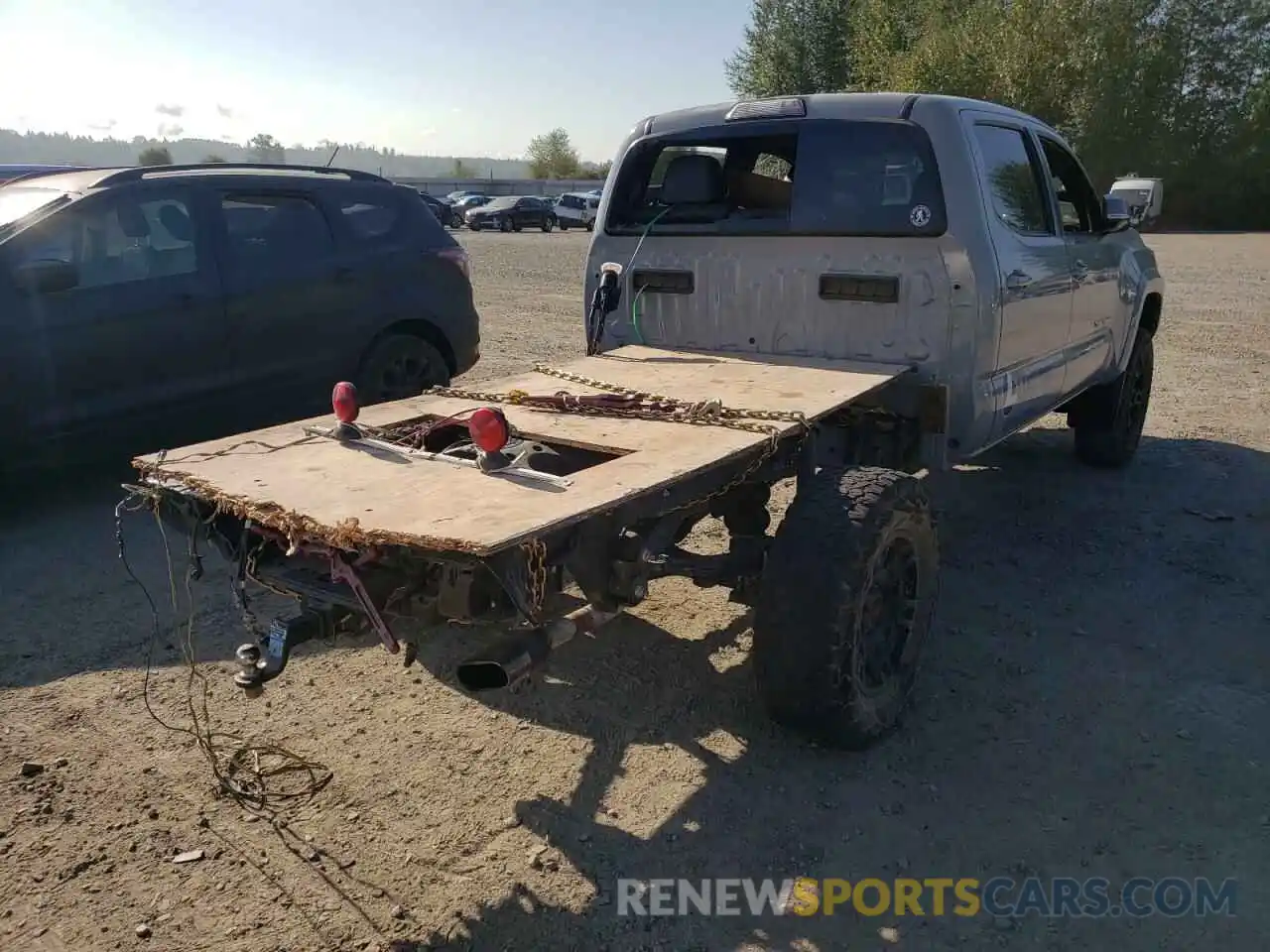 4 Photograph of a damaged car 3TMDZ5BN4KM064748 TOYOTA TACOMA 2019