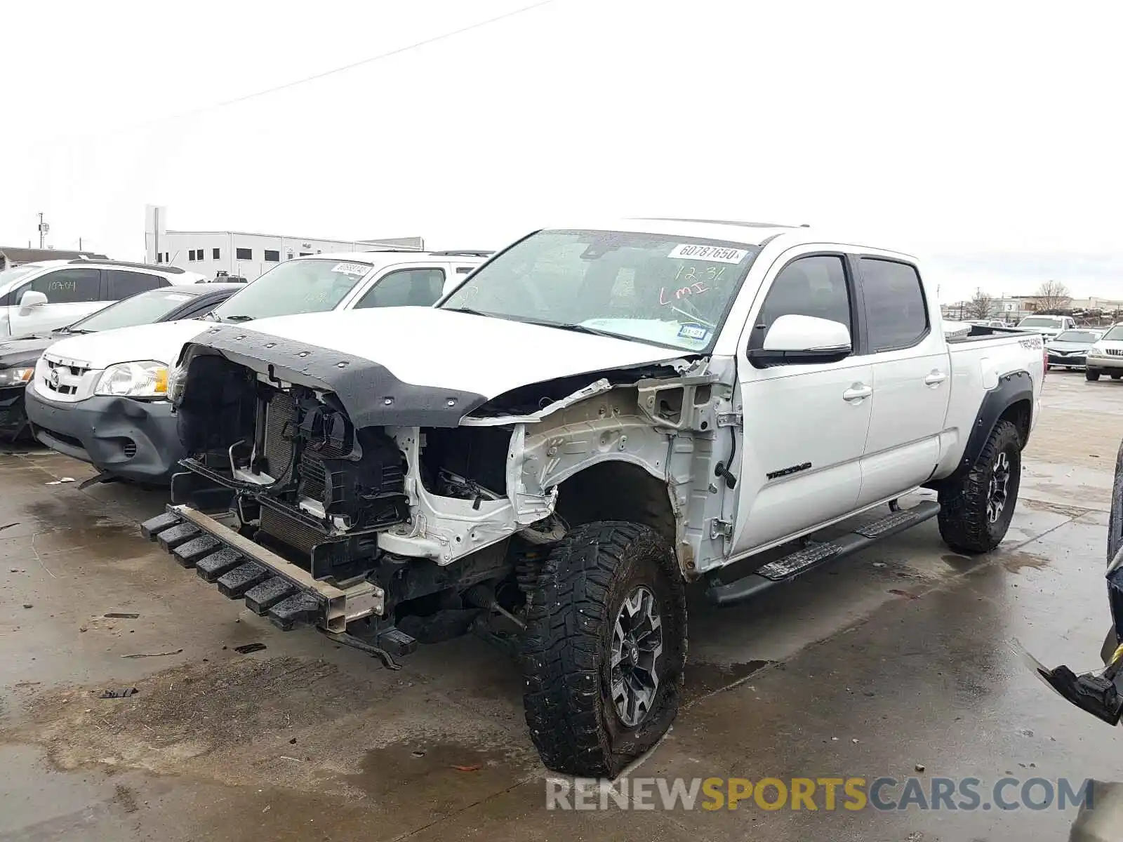 2 Photograph of a damaged car 3TMDZ5BN4KM067438 TOYOTA TACOMA 2019