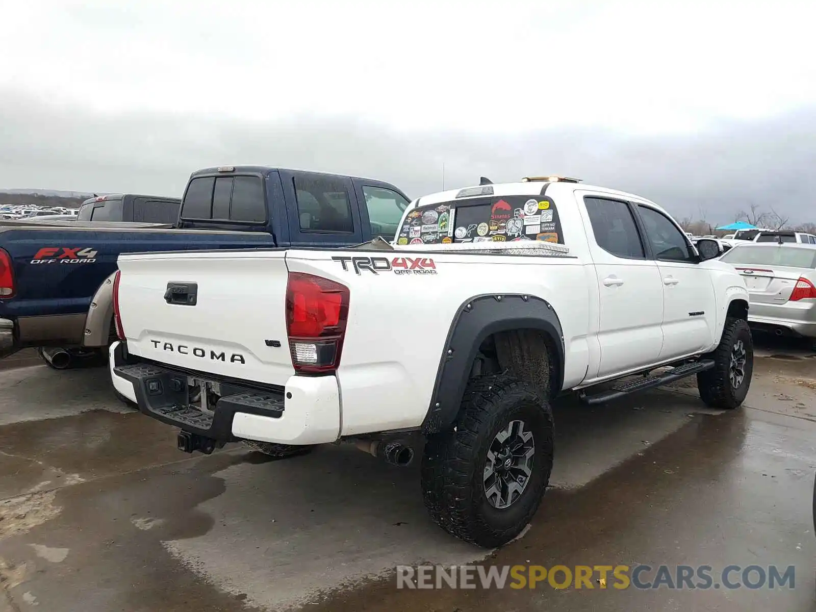 4 Photograph of a damaged car 3TMDZ5BN4KM067438 TOYOTA TACOMA 2019