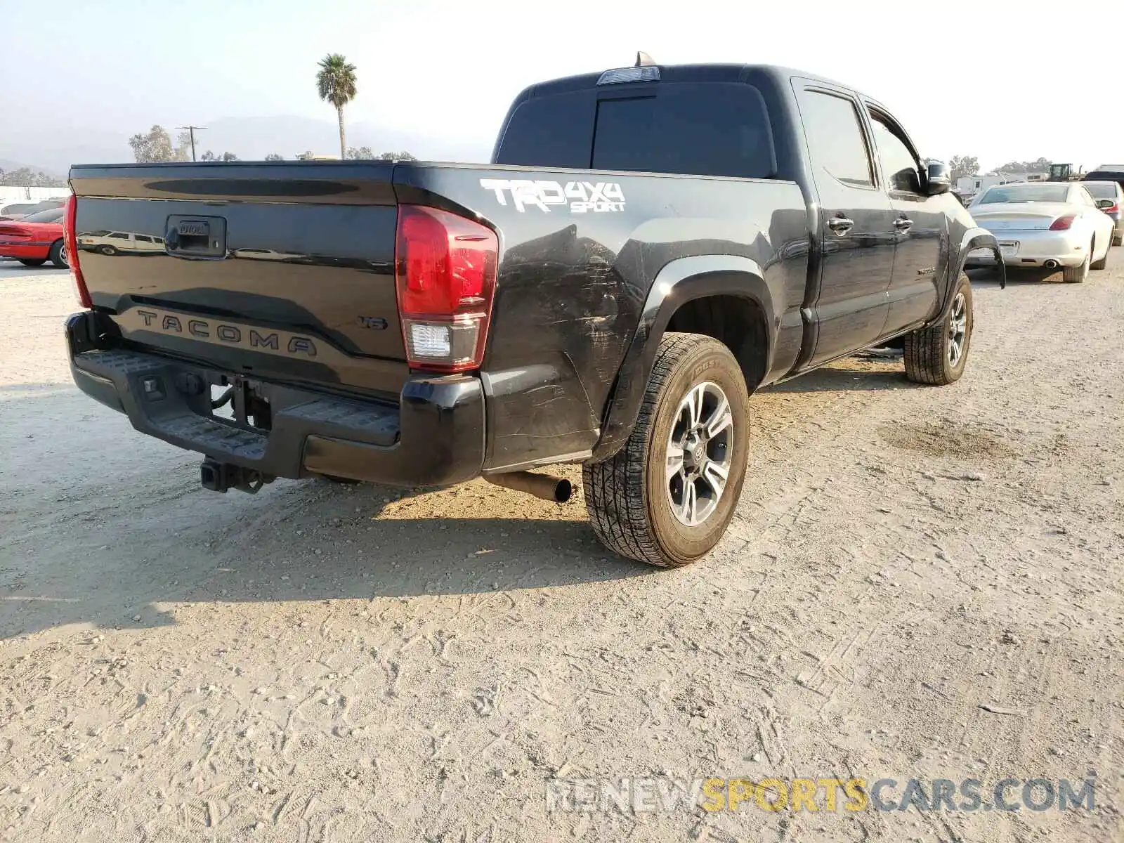 4 Photograph of a damaged car 3TMDZ5BN4KM077385 TOYOTA TACOMA 2019