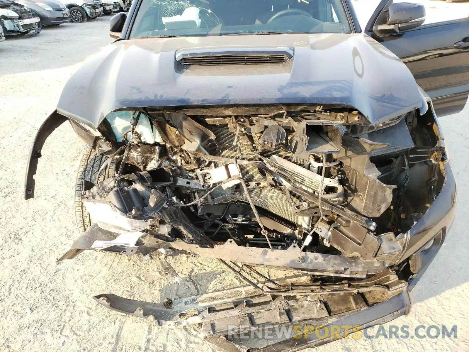 7 Photograph of a damaged car 3TMDZ5BN4KM077385 TOYOTA TACOMA 2019