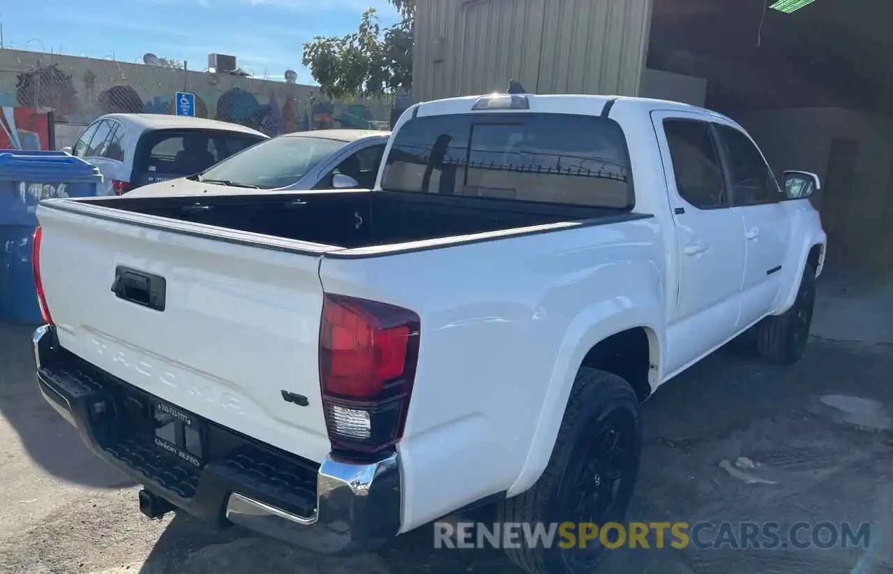 4 Photograph of a damaged car 3TMDZ5BN4KM176966 TOYOTA TACOMA 2019