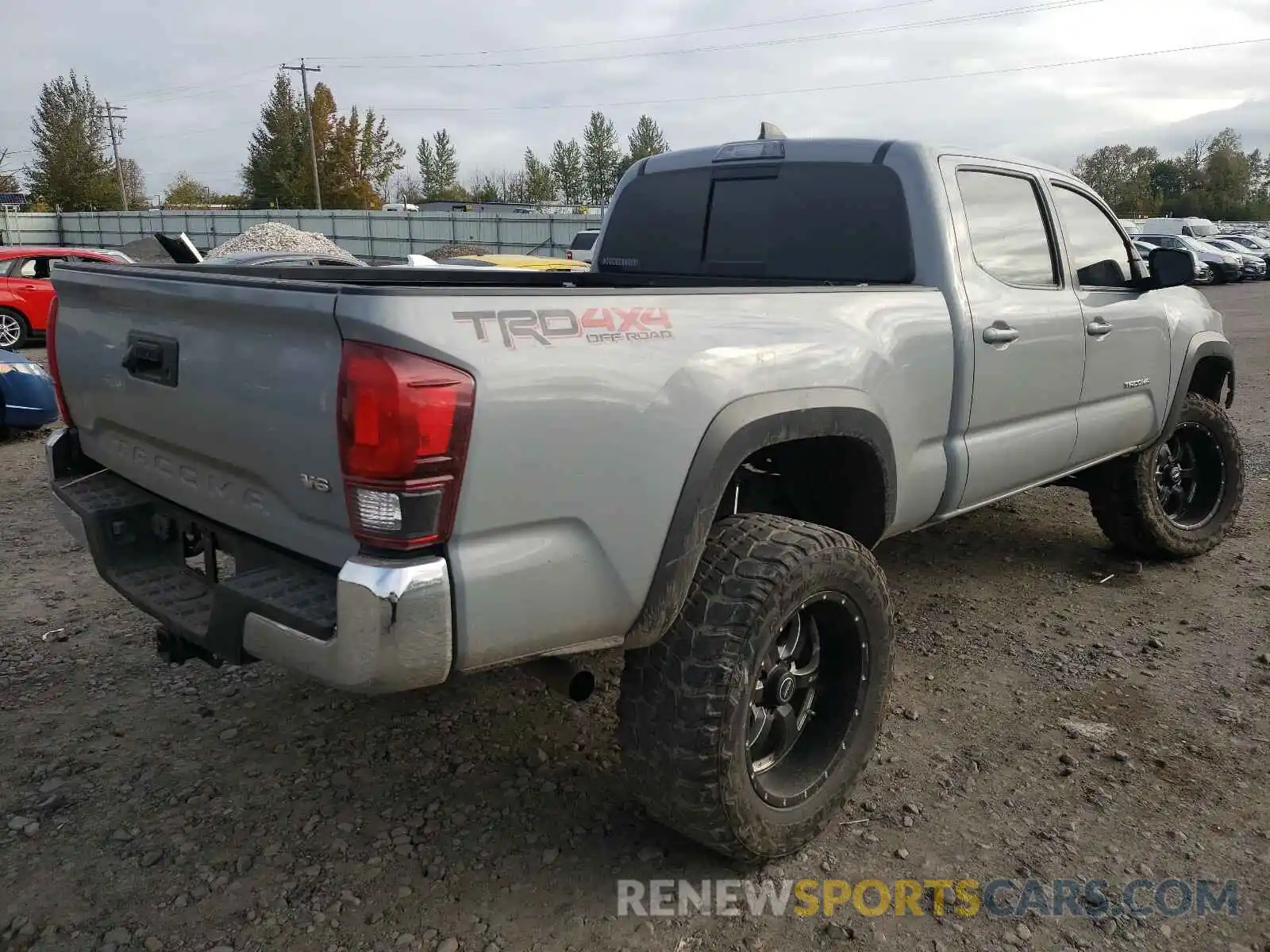 4 Photograph of a damaged car 3TMDZ5BN5KM056979 TOYOTA TACOMA 2019