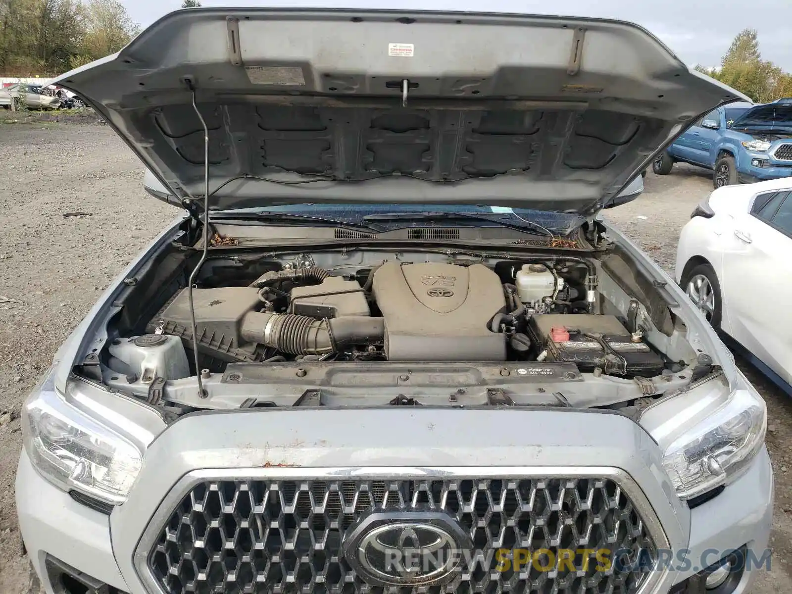 7 Photograph of a damaged car 3TMDZ5BN5KM056979 TOYOTA TACOMA 2019