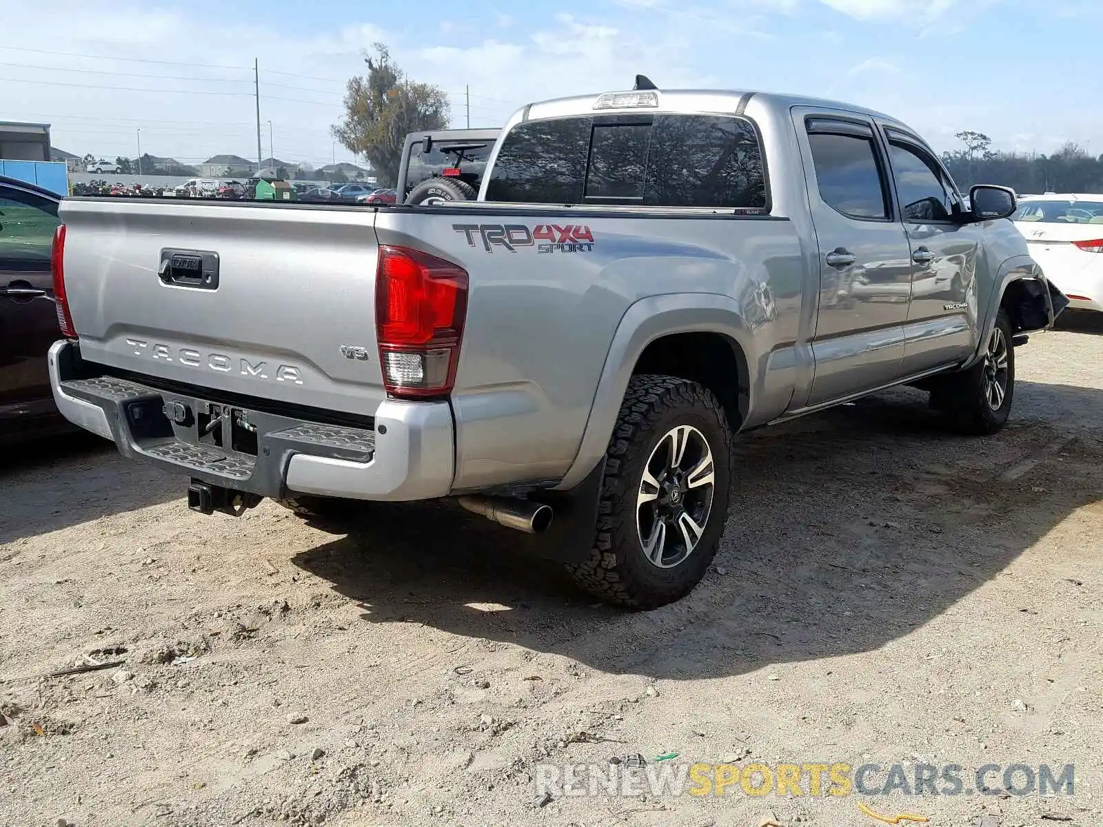 4 Photograph of a damaged car 3TMDZ5BN5KM057775 TOYOTA TACOMA 2019