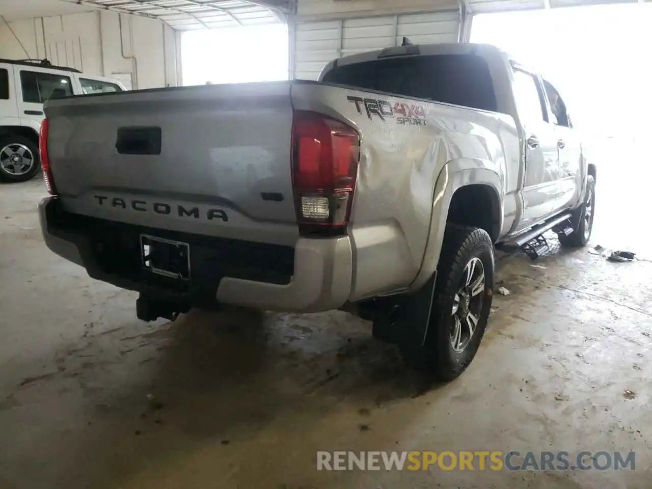 4 Photograph of a damaged car 3TMDZ5BN5KM058411 TOYOTA TACOMA 2019