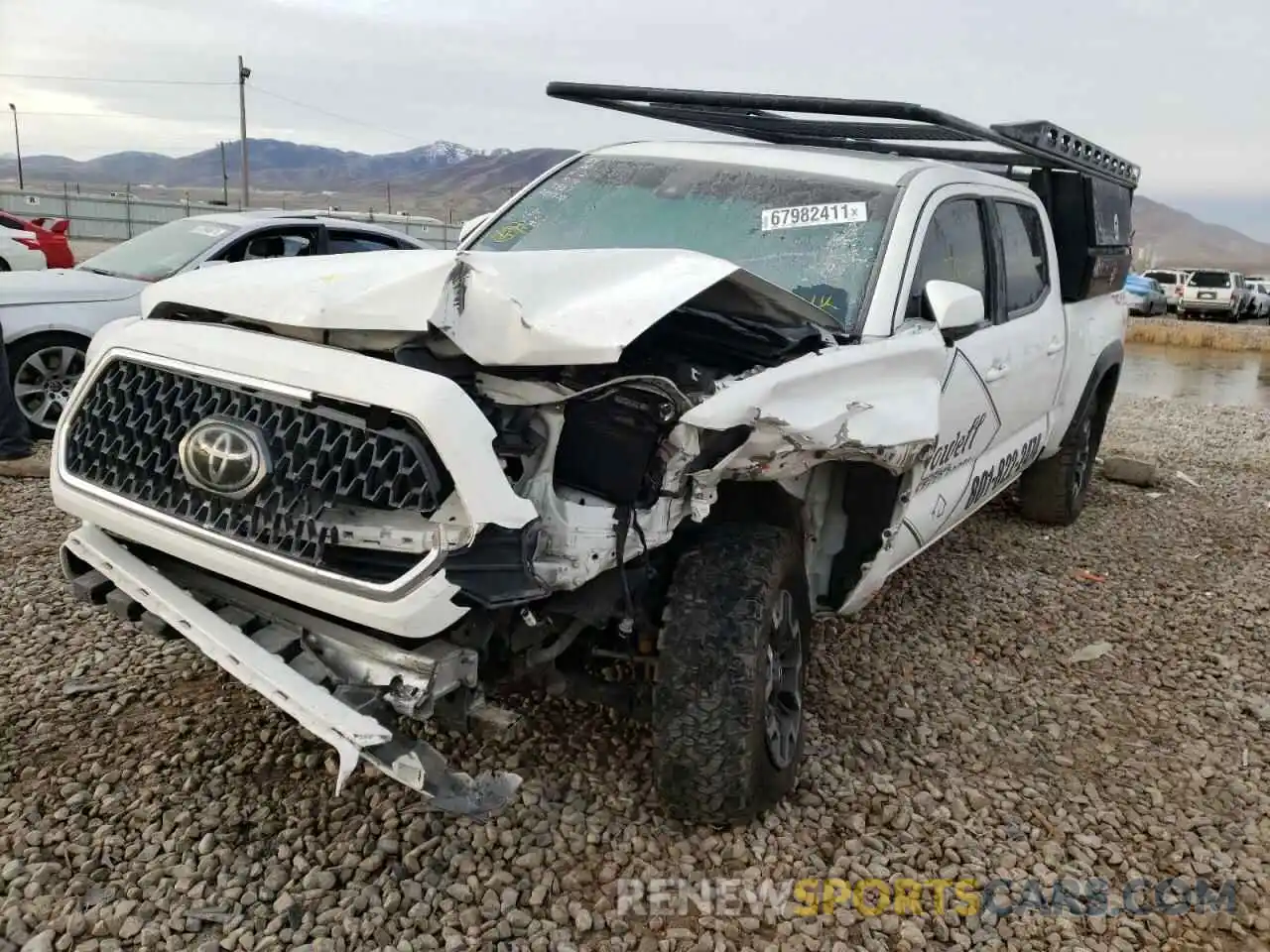 2 Photograph of a damaged car 3TMDZ5BN5KM059770 TOYOTA TACOMA 2019