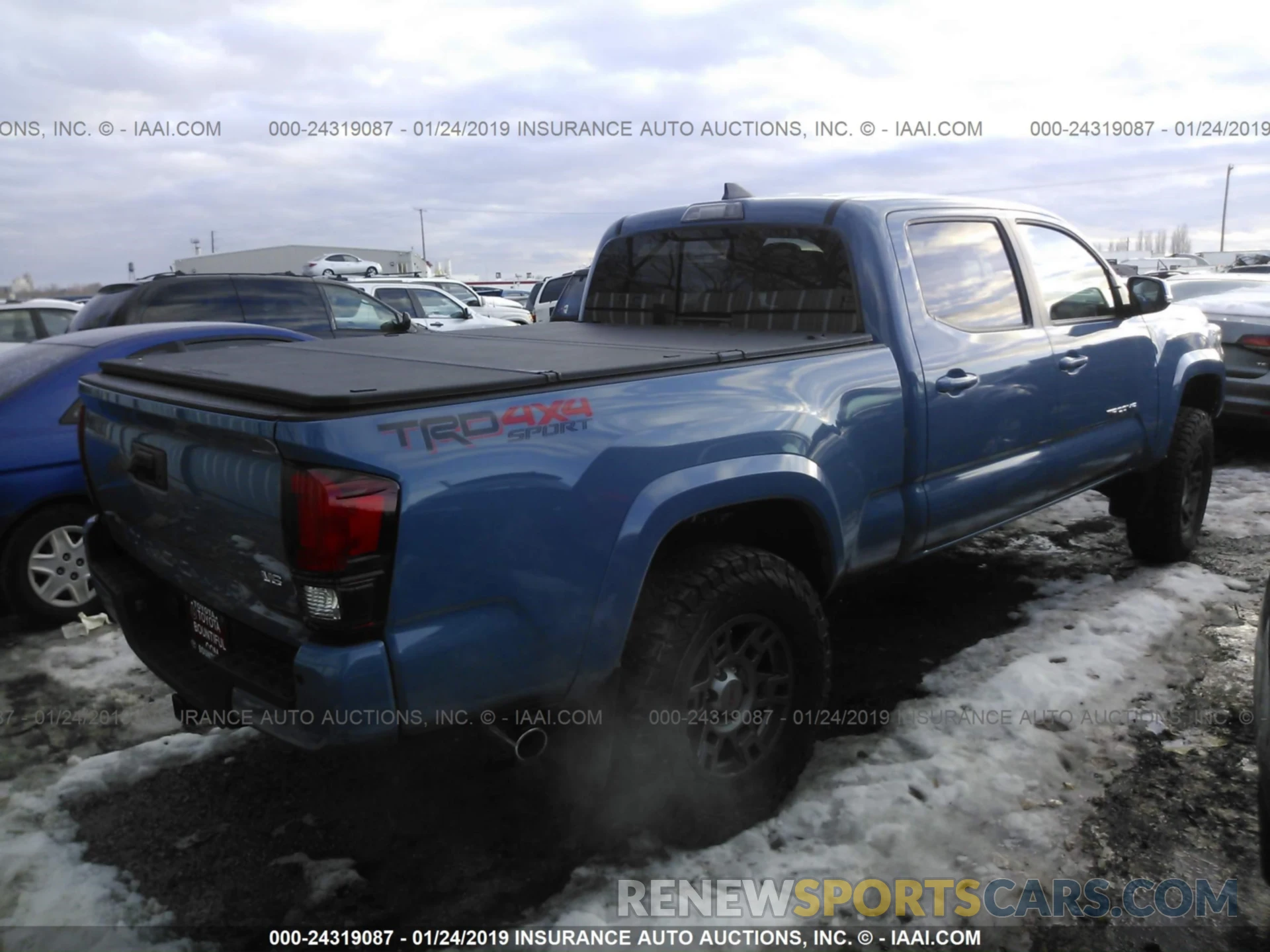 4 Photograph of a damaged car 3TMDZ5BN5KM060594 TOYOTA TACOMA 2019