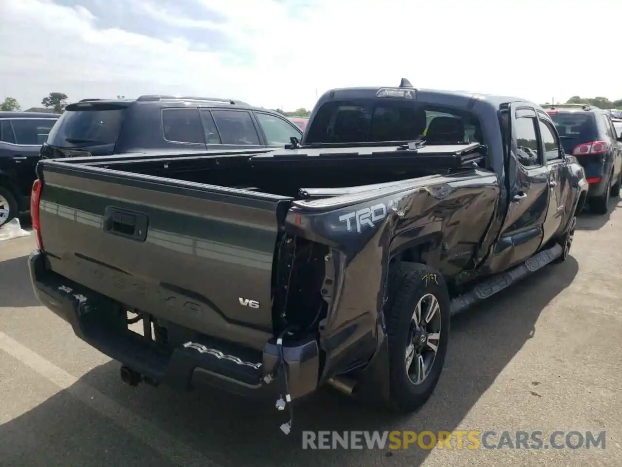 4 Photograph of a damaged car 3TMDZ5BN5KM061566 TOYOTA TACOMA 2019