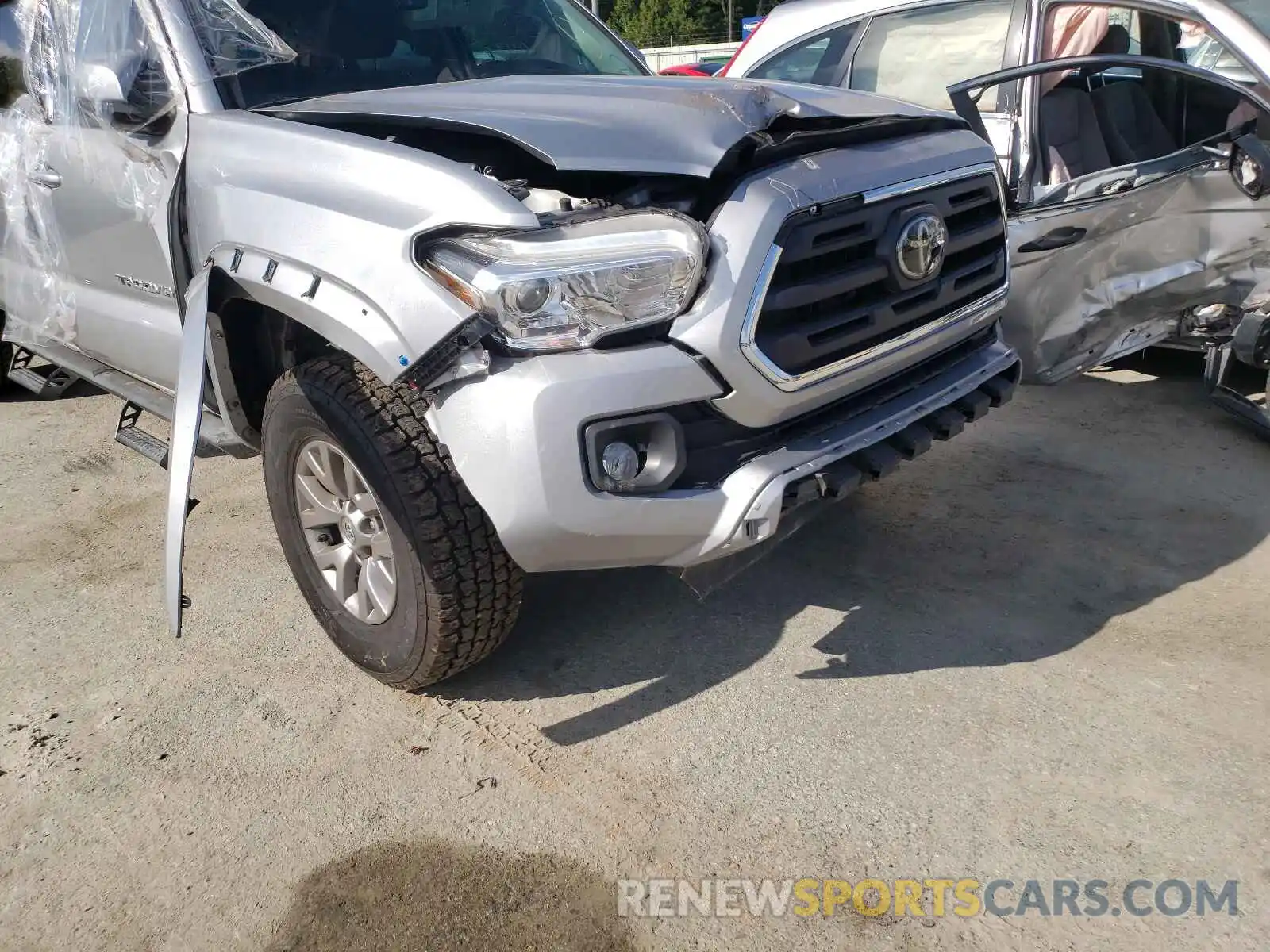 9 Photograph of a damaged car 3TMDZ5BN5KM065150 TOYOTA TACOMA 2019