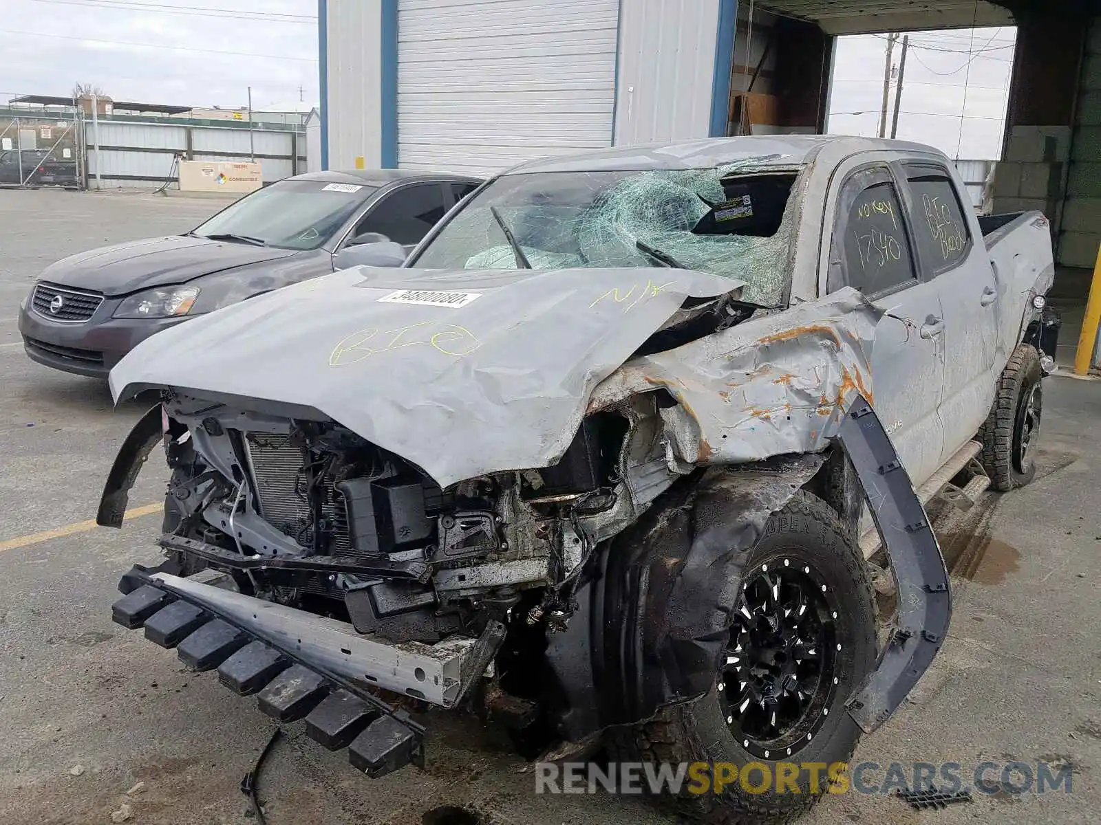 2 Photograph of a damaged car 3TMDZ5BN5KM065679 TOYOTA TACOMA 2019