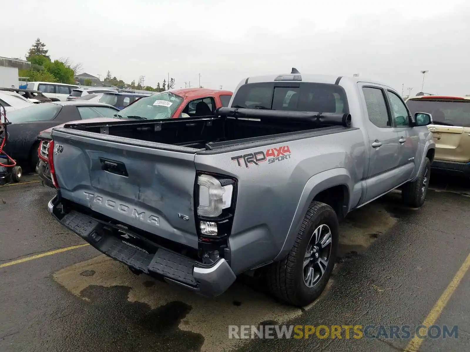 4 Photograph of a damaged car 3TMDZ5BN5KM069554 TOYOTA TACOMA 2019