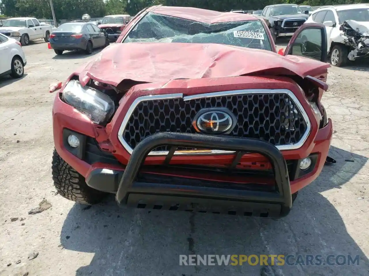 7 Photograph of a damaged car 3TMDZ5BN5KM074673 TOYOTA TACOMA 2019