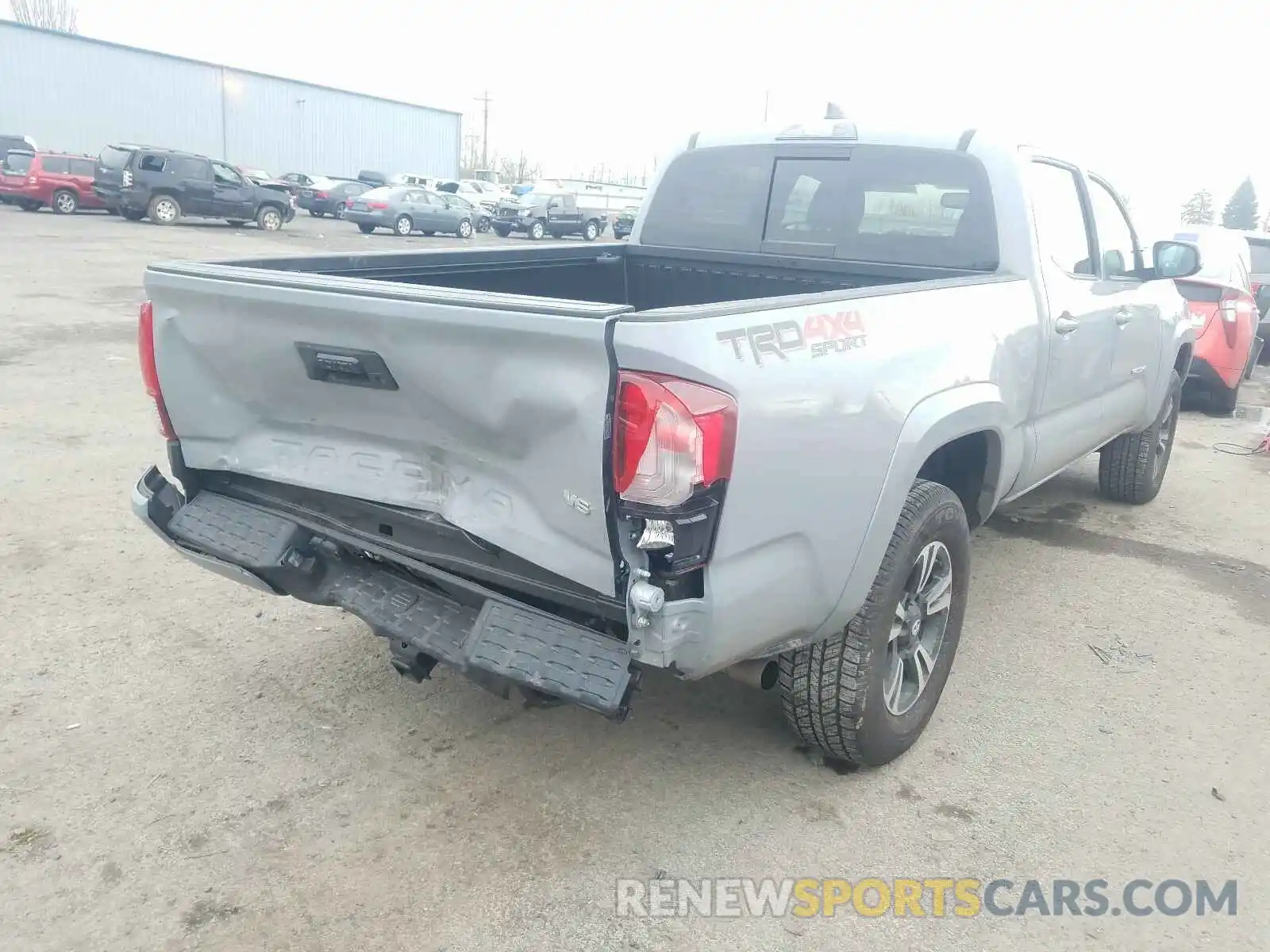 4 Photograph of a damaged car 3TMDZ5BN5KM075094 TOYOTA TACOMA 2019