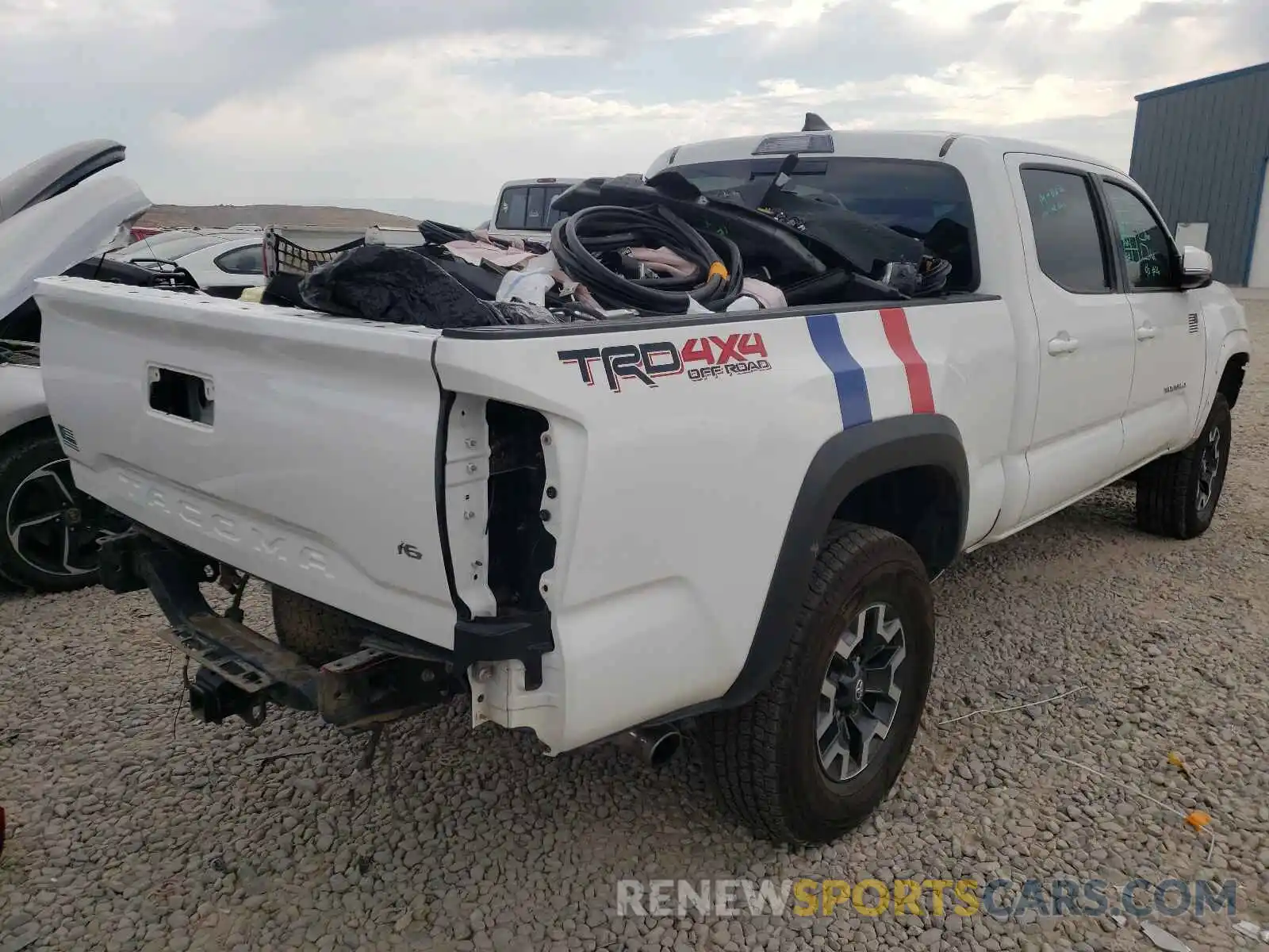 4 Photograph of a damaged car 3TMDZ5BN6KM057204 TOYOTA TACOMA 2019