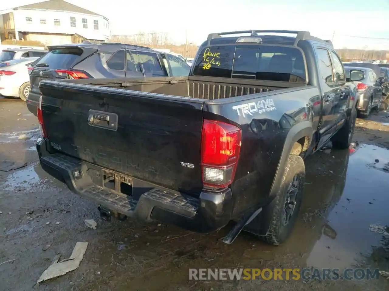 4 Photograph of a damaged car 3TMDZ5BN6KM059633 TOYOTA TACOMA 2019