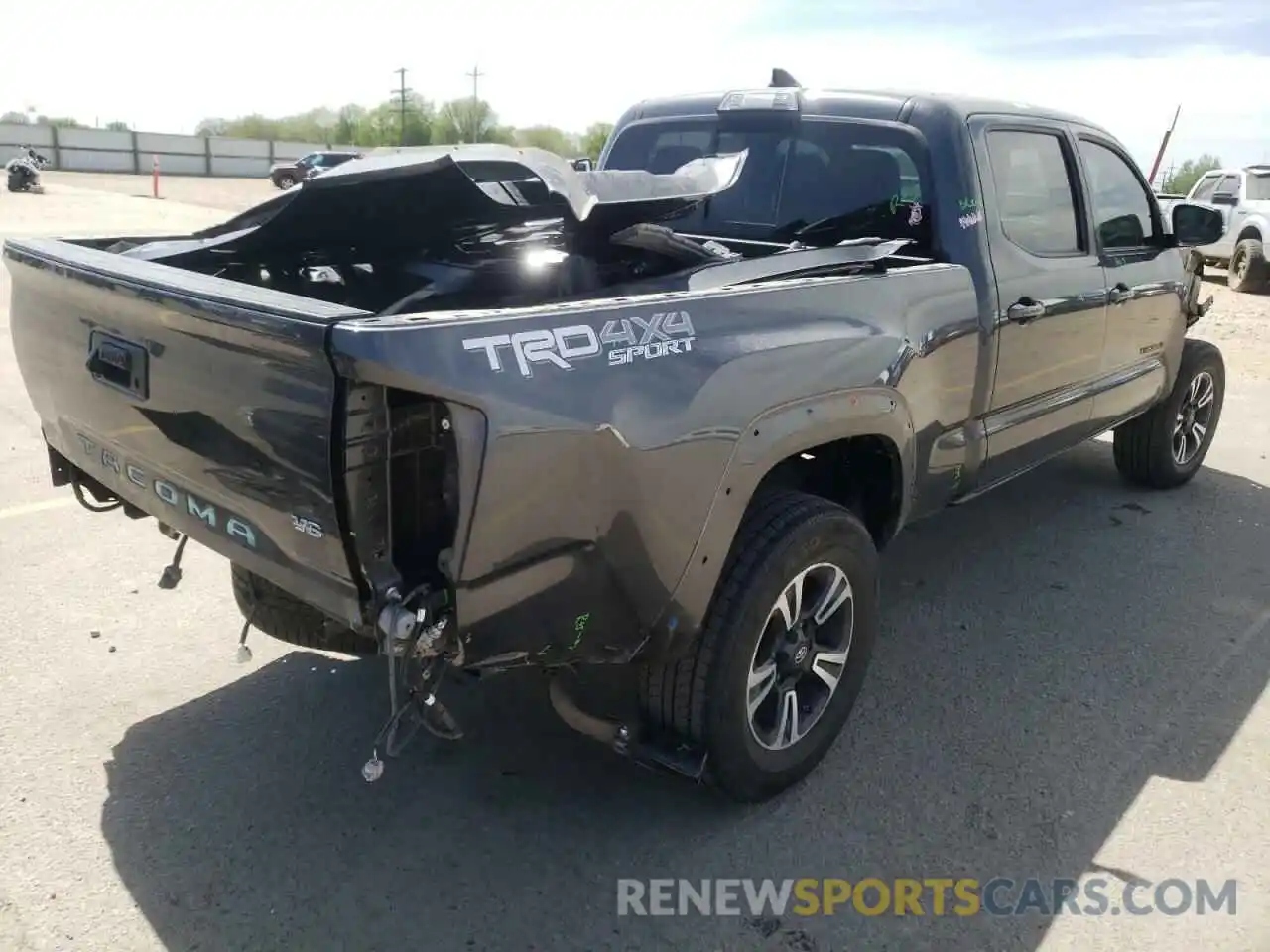 4 Photograph of a damaged car 3TMDZ5BN6KM060037 TOYOTA TACOMA 2019