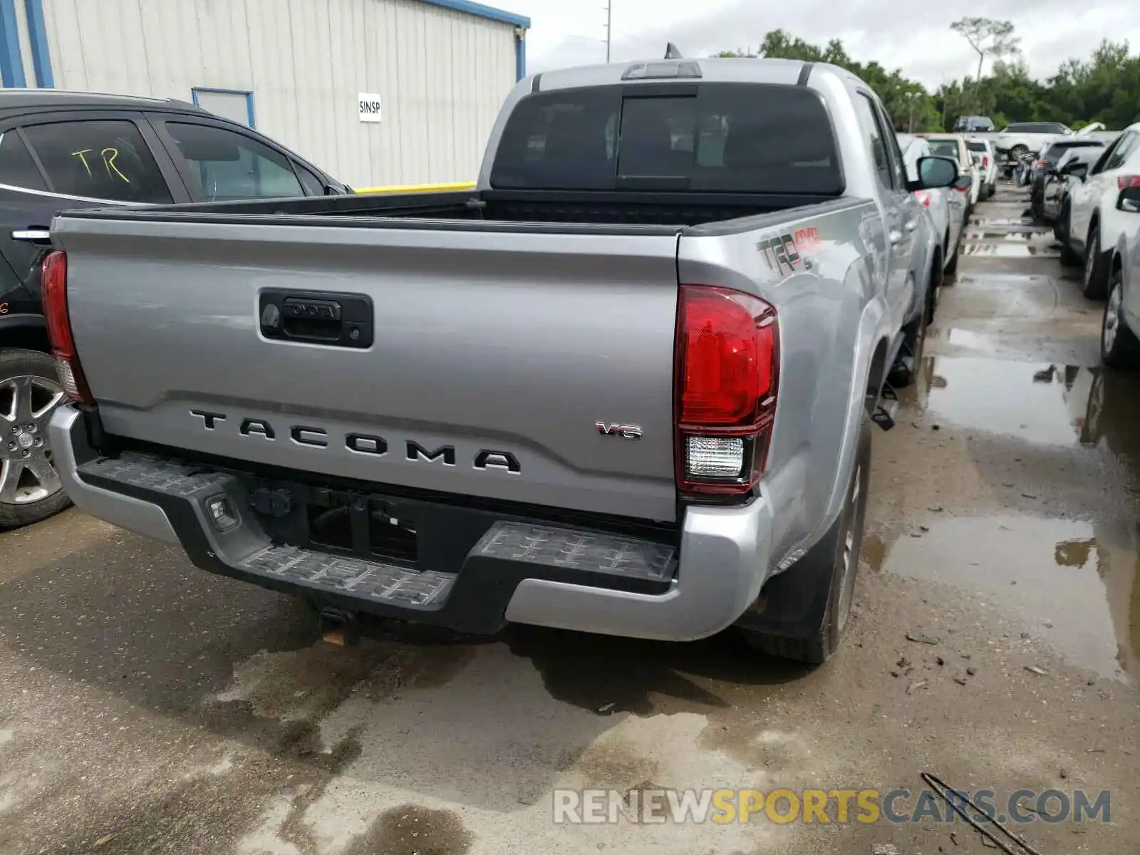 4 Photograph of a damaged car 3TMDZ5BN6KM060460 TOYOTA TACOMA 2019