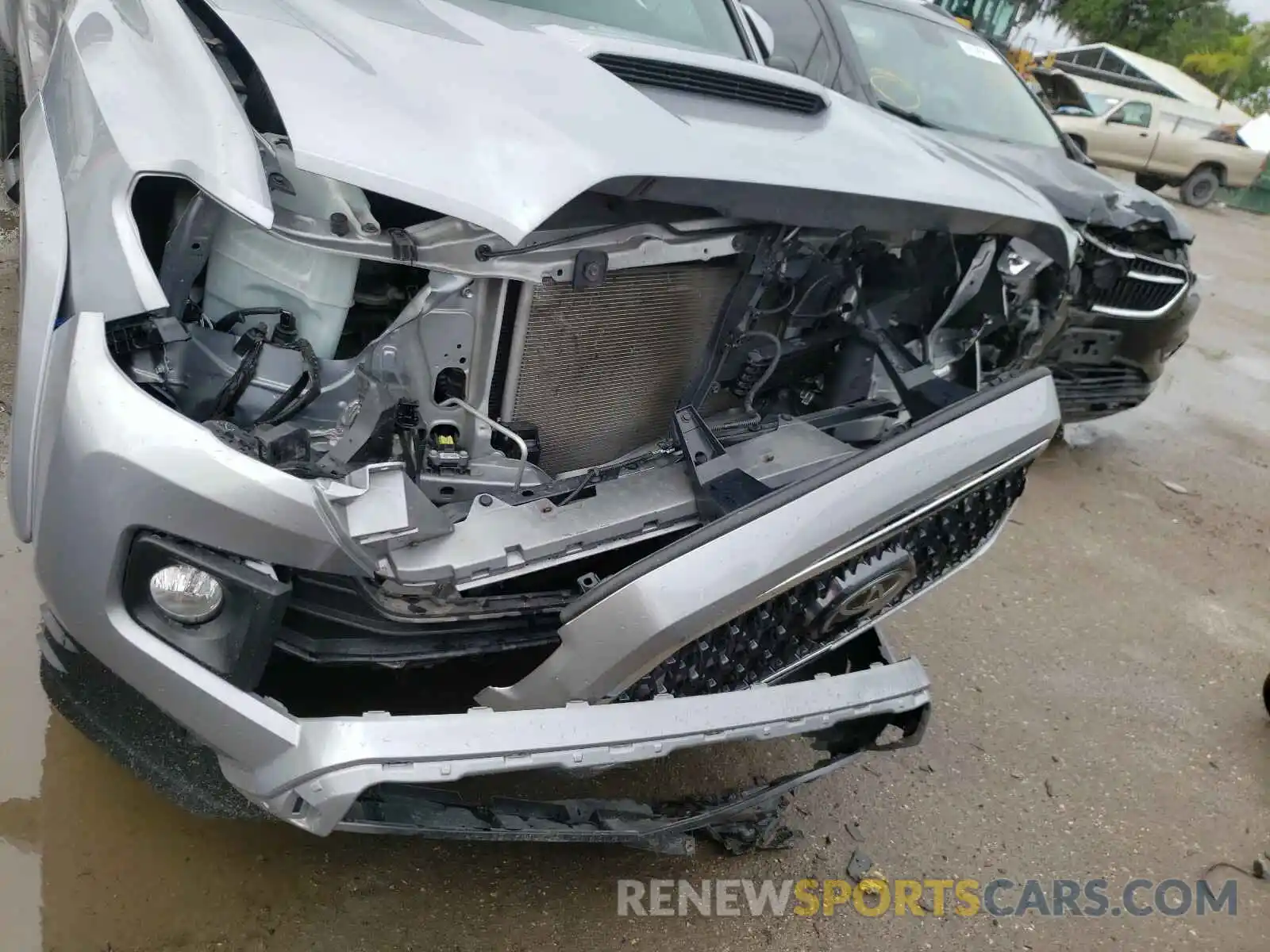 9 Photograph of a damaged car 3TMDZ5BN6KM060460 TOYOTA TACOMA 2019
