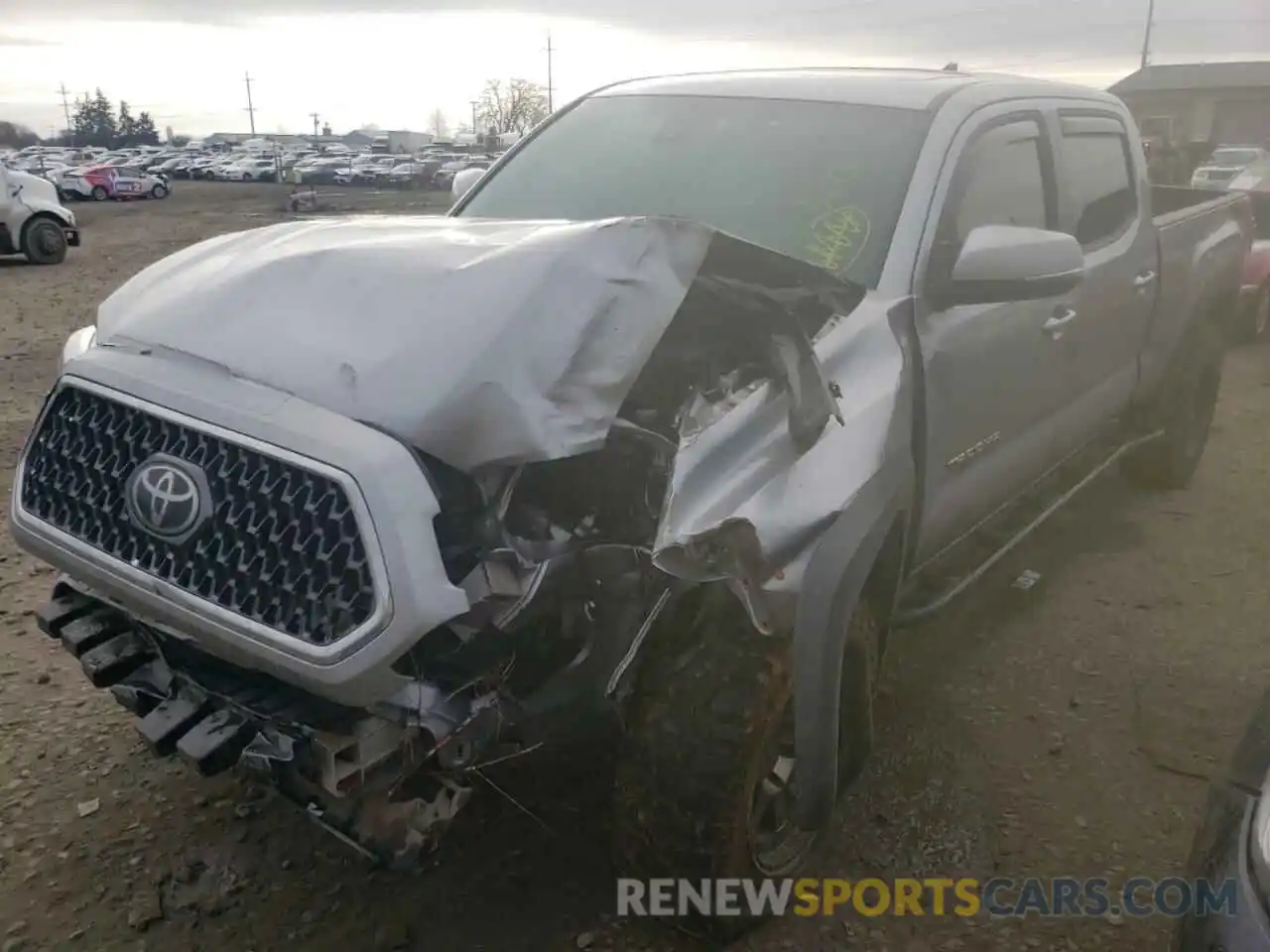 2 Photograph of a damaged car 3TMDZ5BN6KM060555 TOYOTA TACOMA 2019