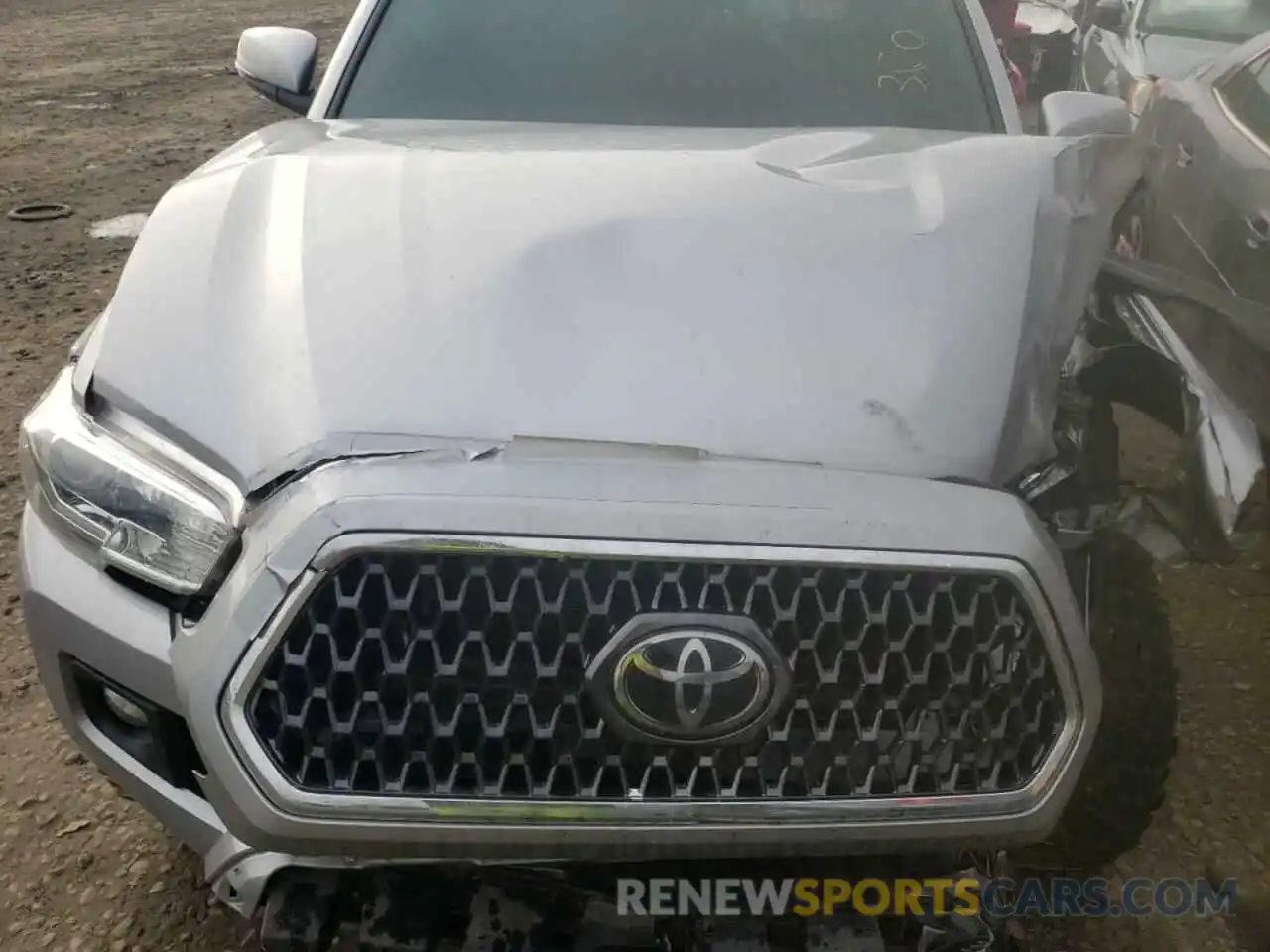 7 Photograph of a damaged car 3TMDZ5BN6KM060555 TOYOTA TACOMA 2019