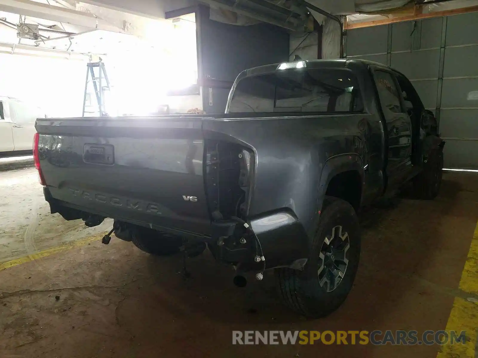 4 Photograph of a damaged car 3TMDZ5BN6KM061107 TOYOTA TACOMA 2019