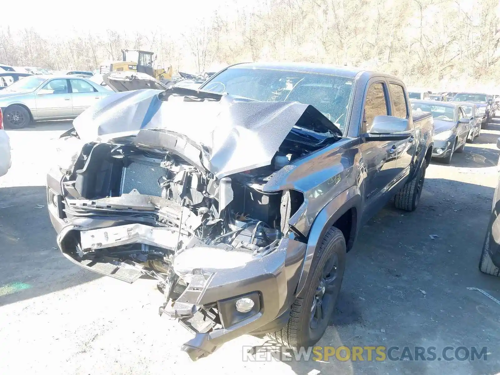 2 Photograph of a damaged car 3TMDZ5BN6KM064833 TOYOTA TACOMA 2019