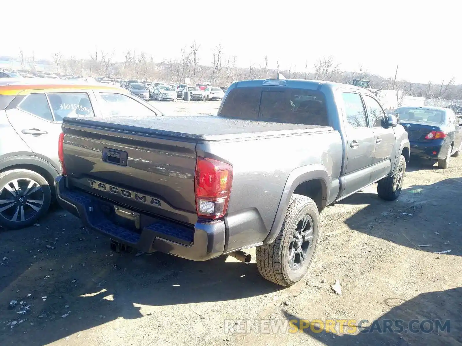 4 Photograph of a damaged car 3TMDZ5BN6KM064833 TOYOTA TACOMA 2019