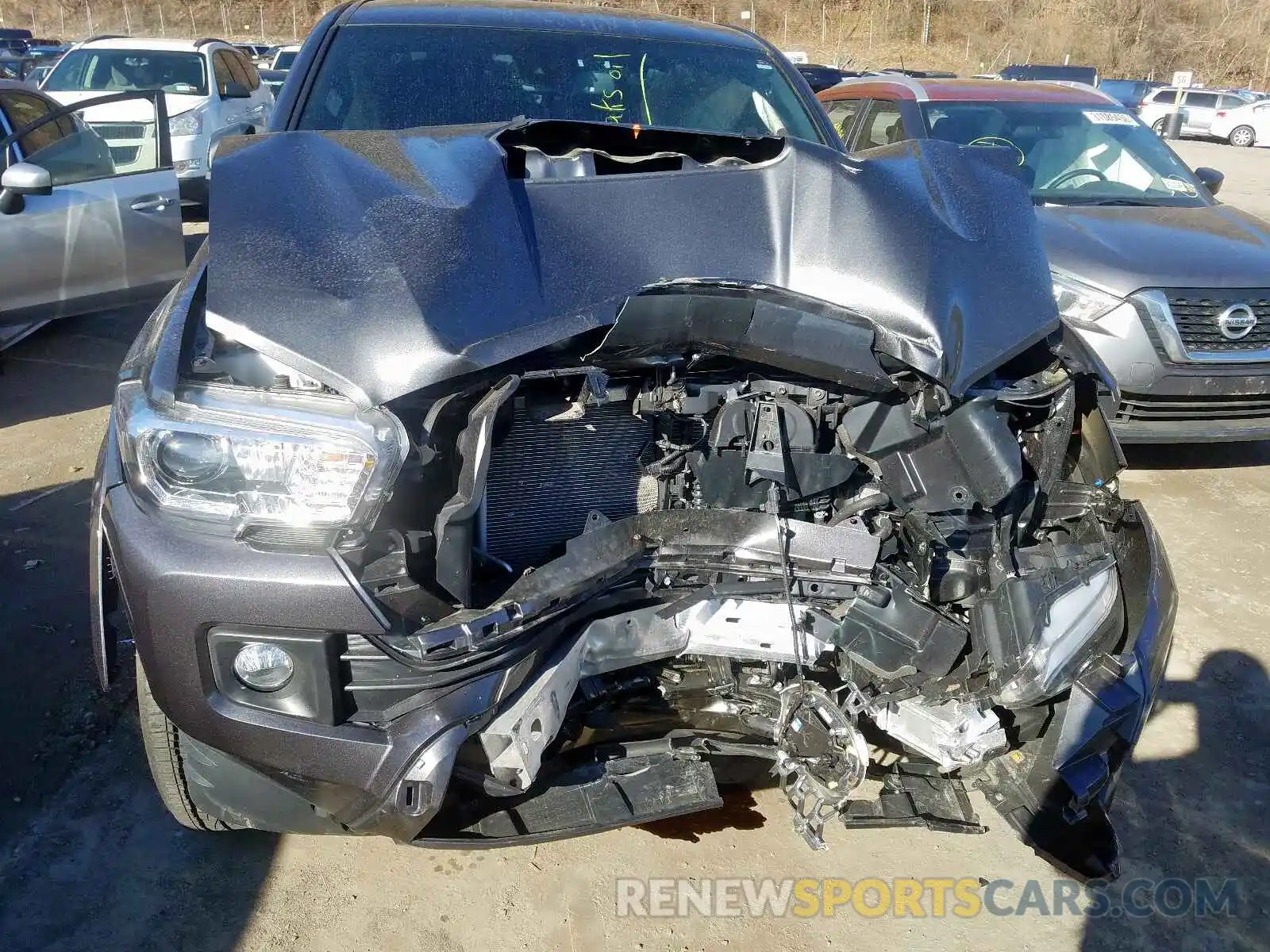 7 Photograph of a damaged car 3TMDZ5BN6KM064833 TOYOTA TACOMA 2019