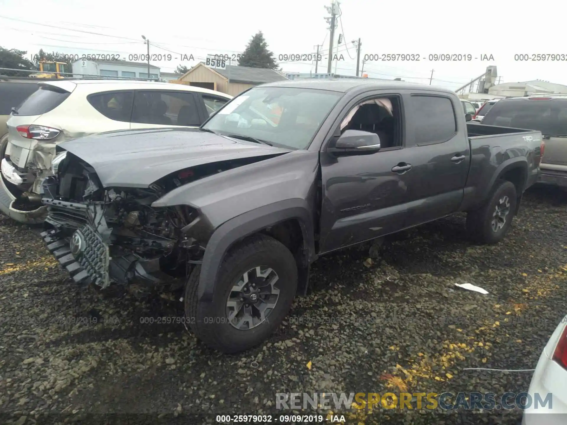 2 Photograph of a damaged car 3TMDZ5BN6KM068994 TOYOTA TACOMA 2019