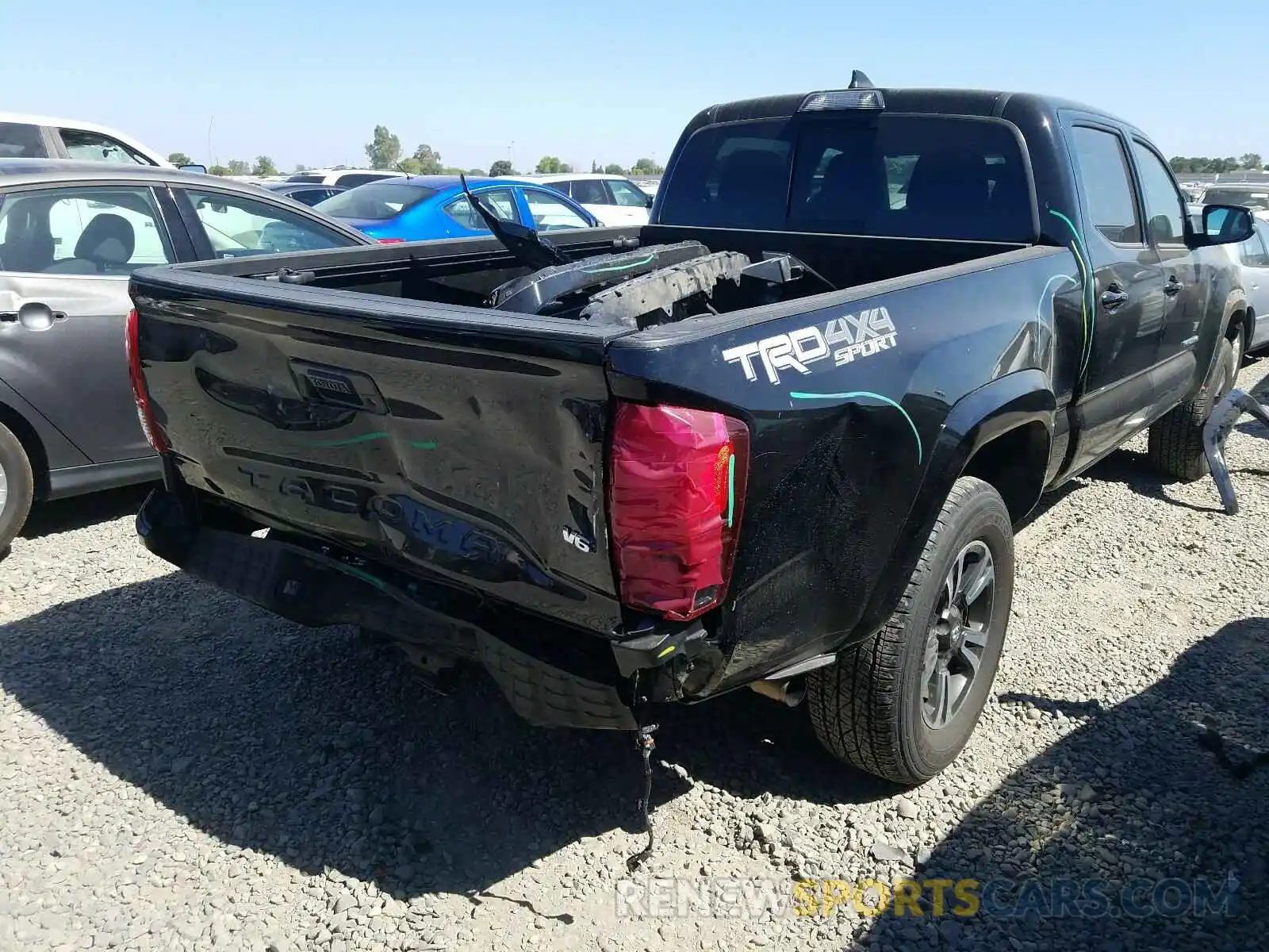 4 Photograph of a damaged car 3TMDZ5BN6KM071555 TOYOTA TACOMA 2019