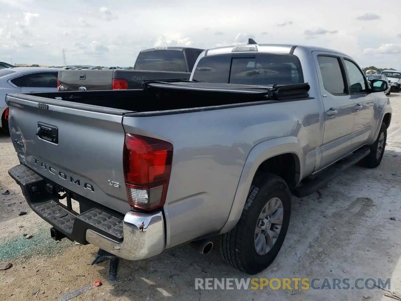 4 Photograph of a damaged car 3TMDZ5BN6KM072463 TOYOTA TACOMA 2019