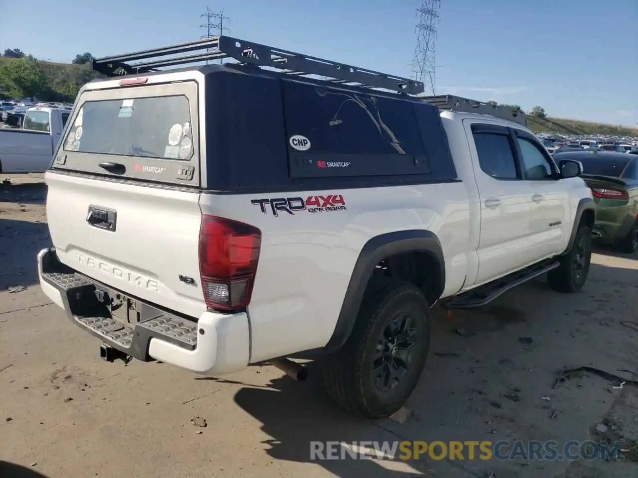 4 Photograph of a damaged car 3TMDZ5BN6KM079879 TOYOTA TACOMA 2019