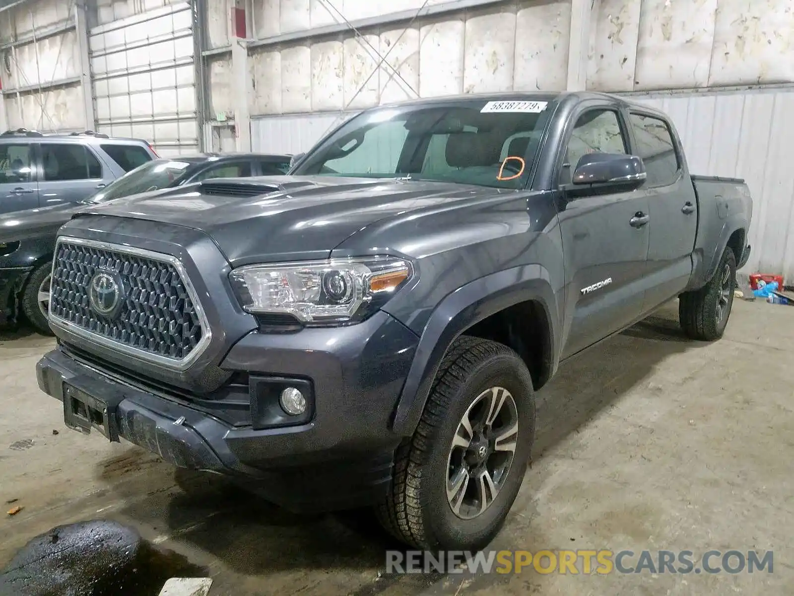 2 Photograph of a damaged car 3TMDZ5BN7KM057518 TOYOTA TACOMA 2019