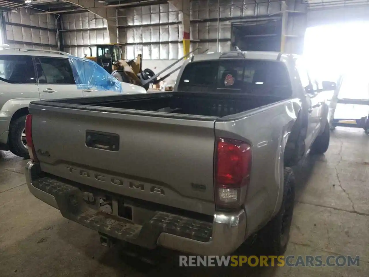 4 Photograph of a damaged car 3TMDZ5BN7KM061584 TOYOTA TACOMA 2019