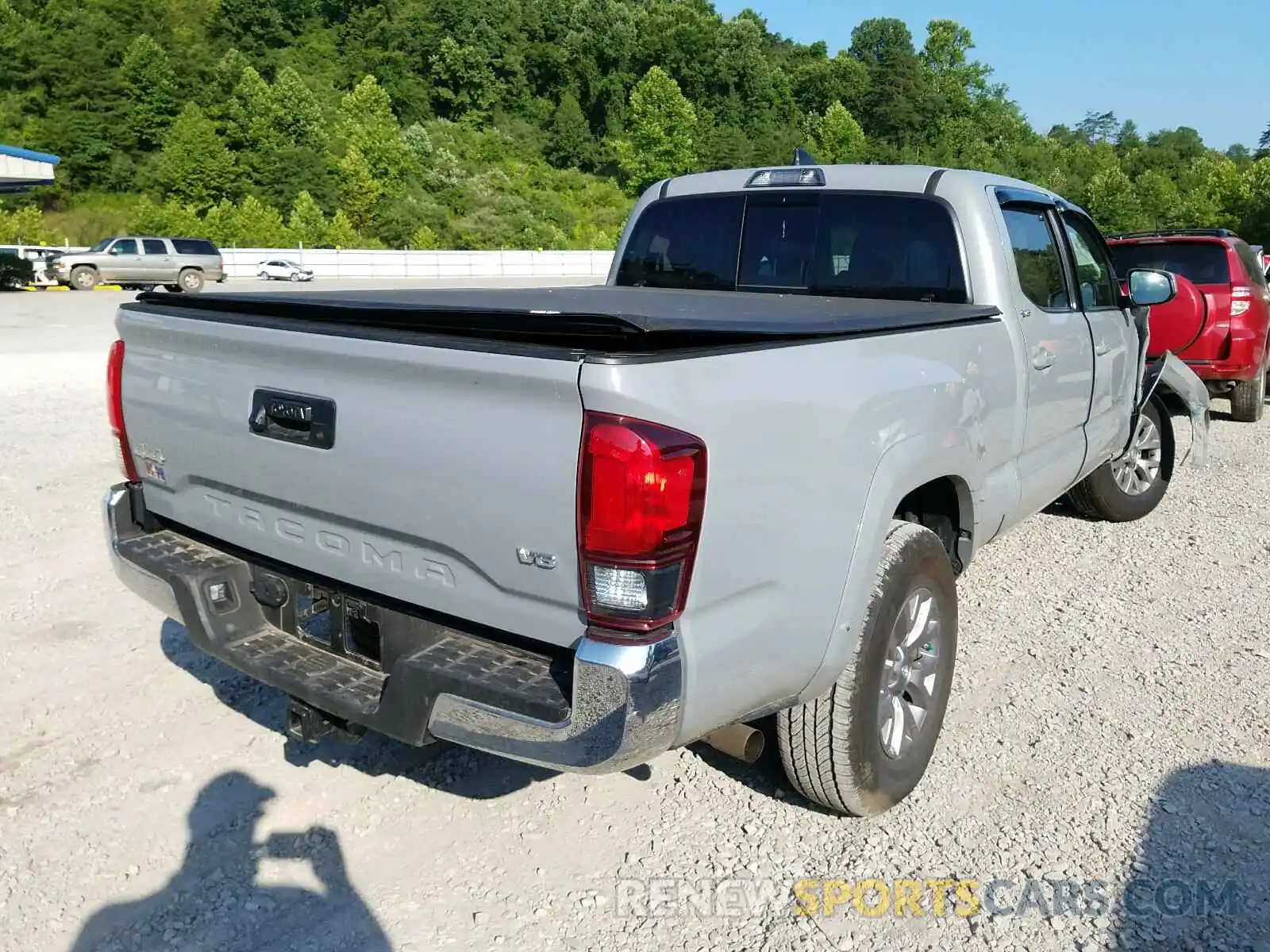 4 Photograph of a damaged car 3TMDZ5BN7KM069703 TOYOTA TACOMA 2019