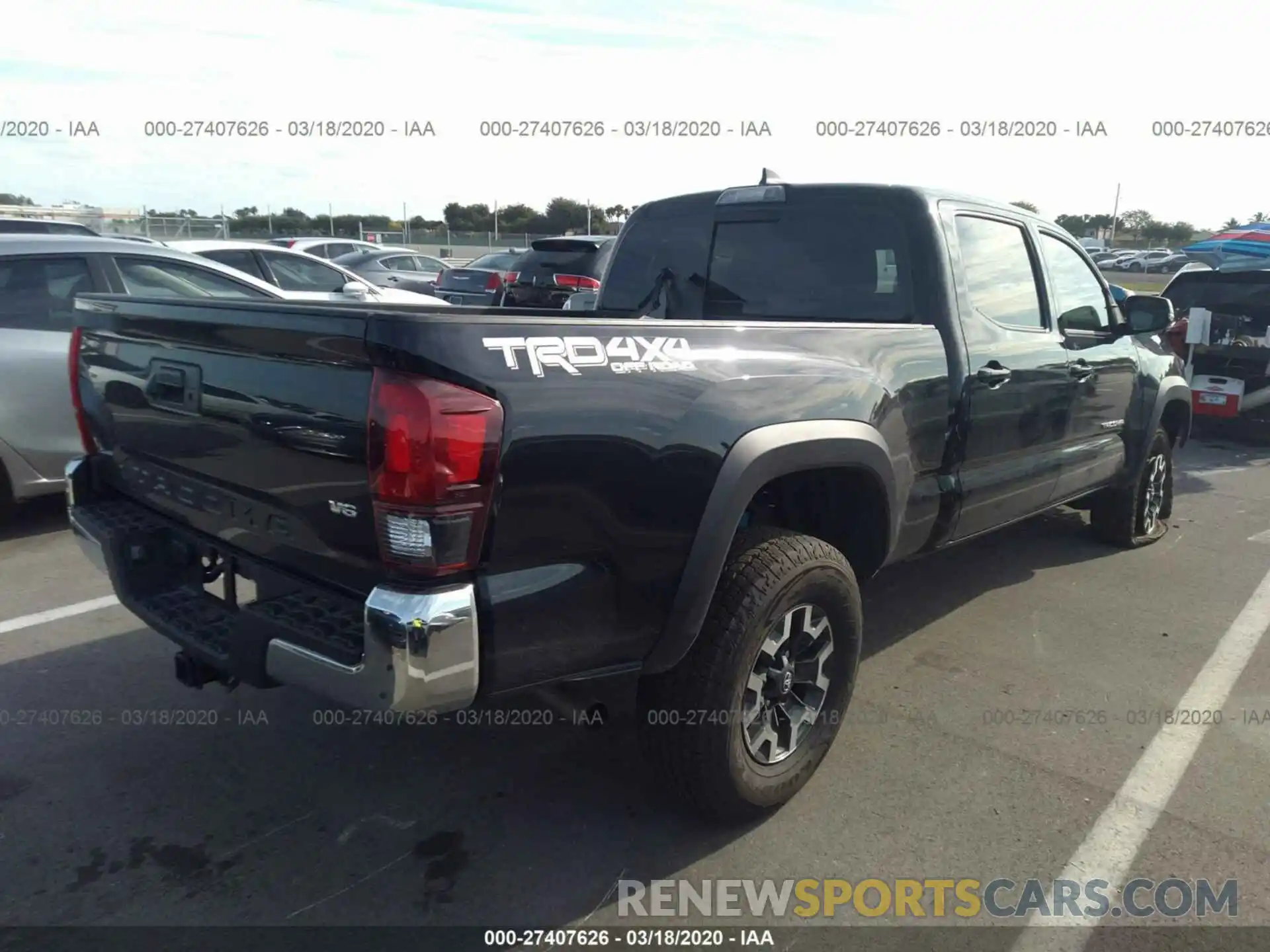 4 Photograph of a damaged car 3TMDZ5BN7KM076697 TOYOTA TACOMA 2019