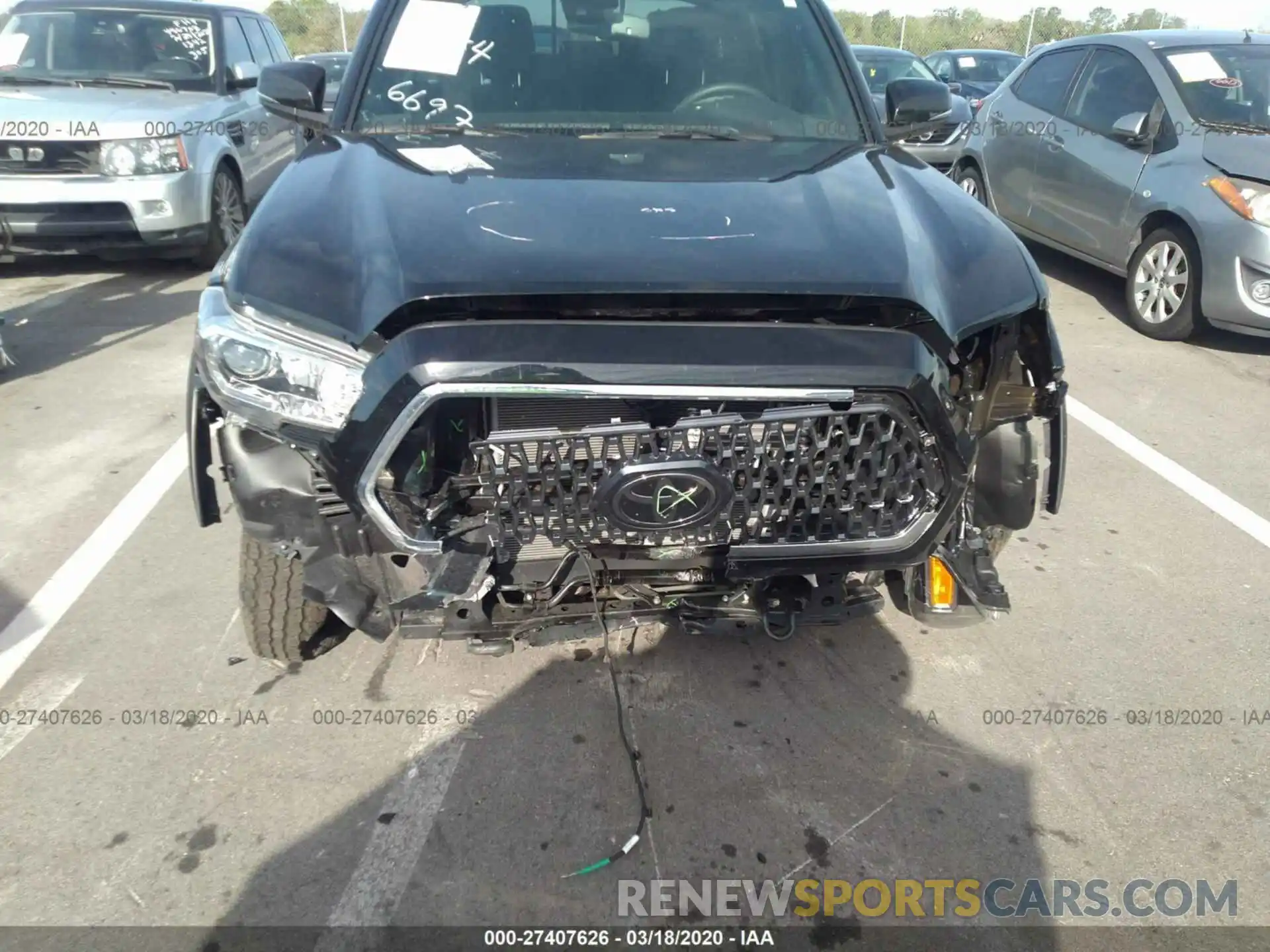 6 Photograph of a damaged car 3TMDZ5BN7KM076697 TOYOTA TACOMA 2019