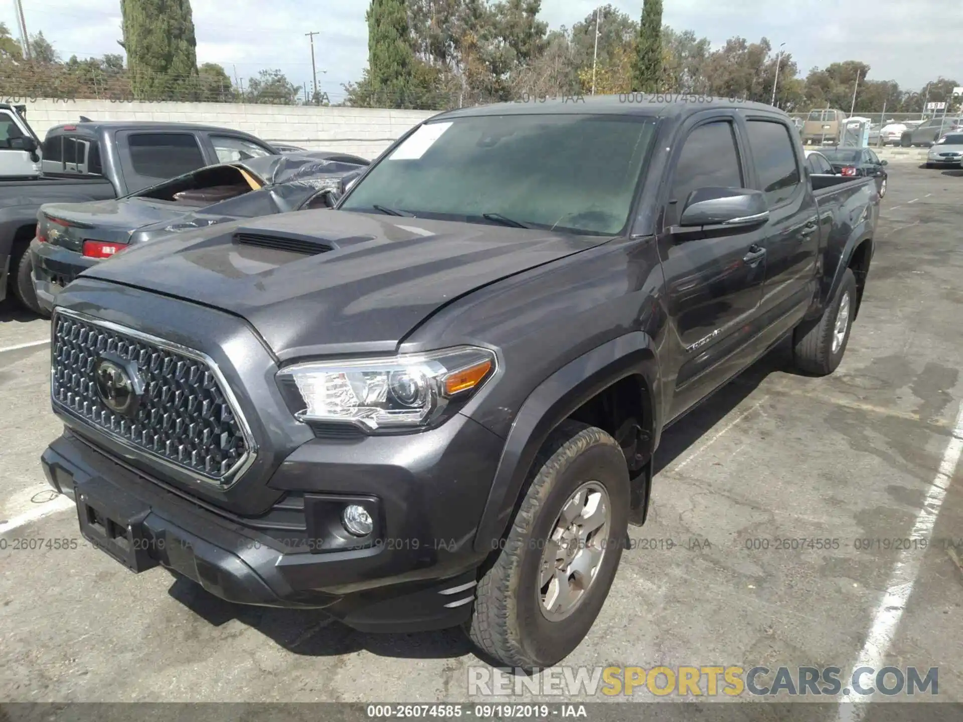 2 Photograph of a damaged car 3TMDZ5BN8KM055678 TOYOTA TACOMA 2019